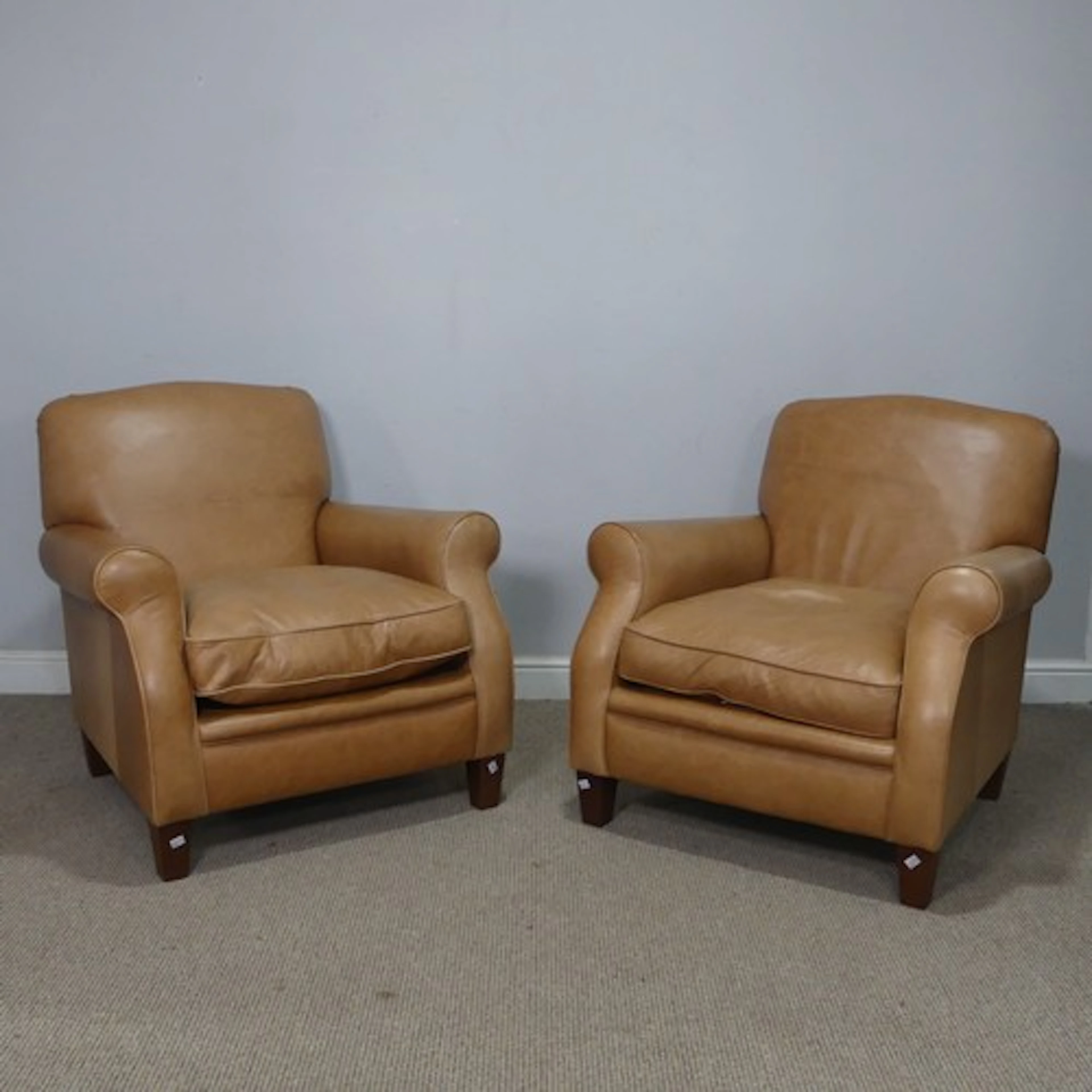 A pair of tan leather unholstered Armchairs, W 72 cm x H 90 ...