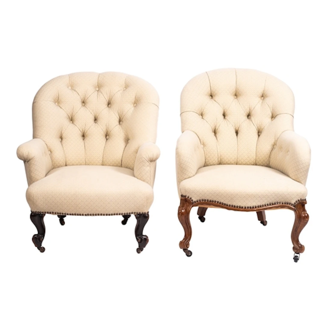 Two similar button upholstered armchairs in 19th century sty...