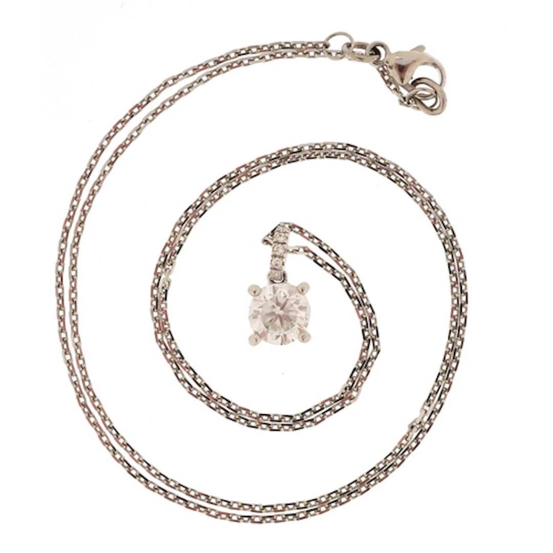 Platinum diamond solitaire pendant with diamond set bail on ...