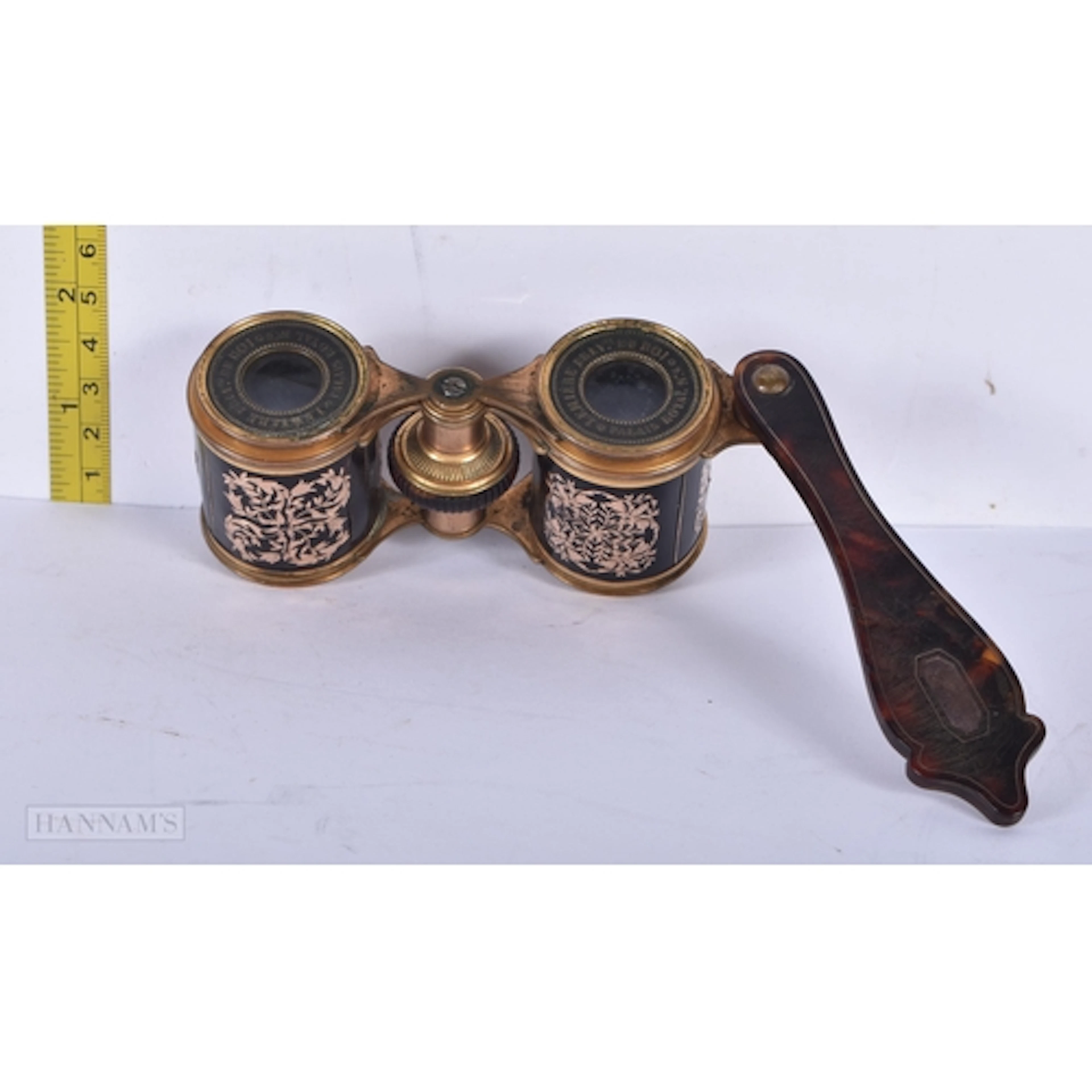 A pair of antique French opera glasses with a tortoiseshell ...