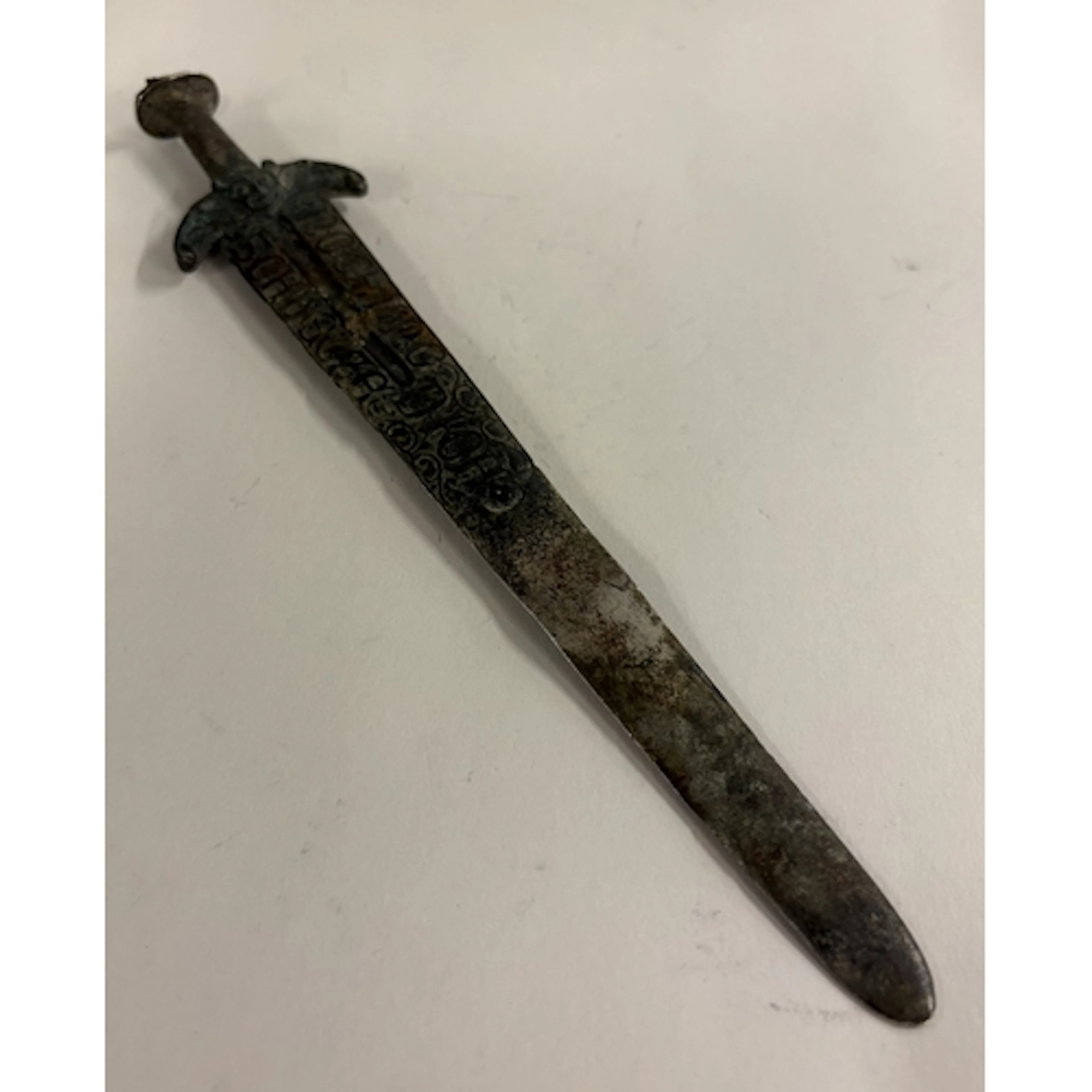 An Antique silver model of a sword. Approx. 114 grams. Est. ...