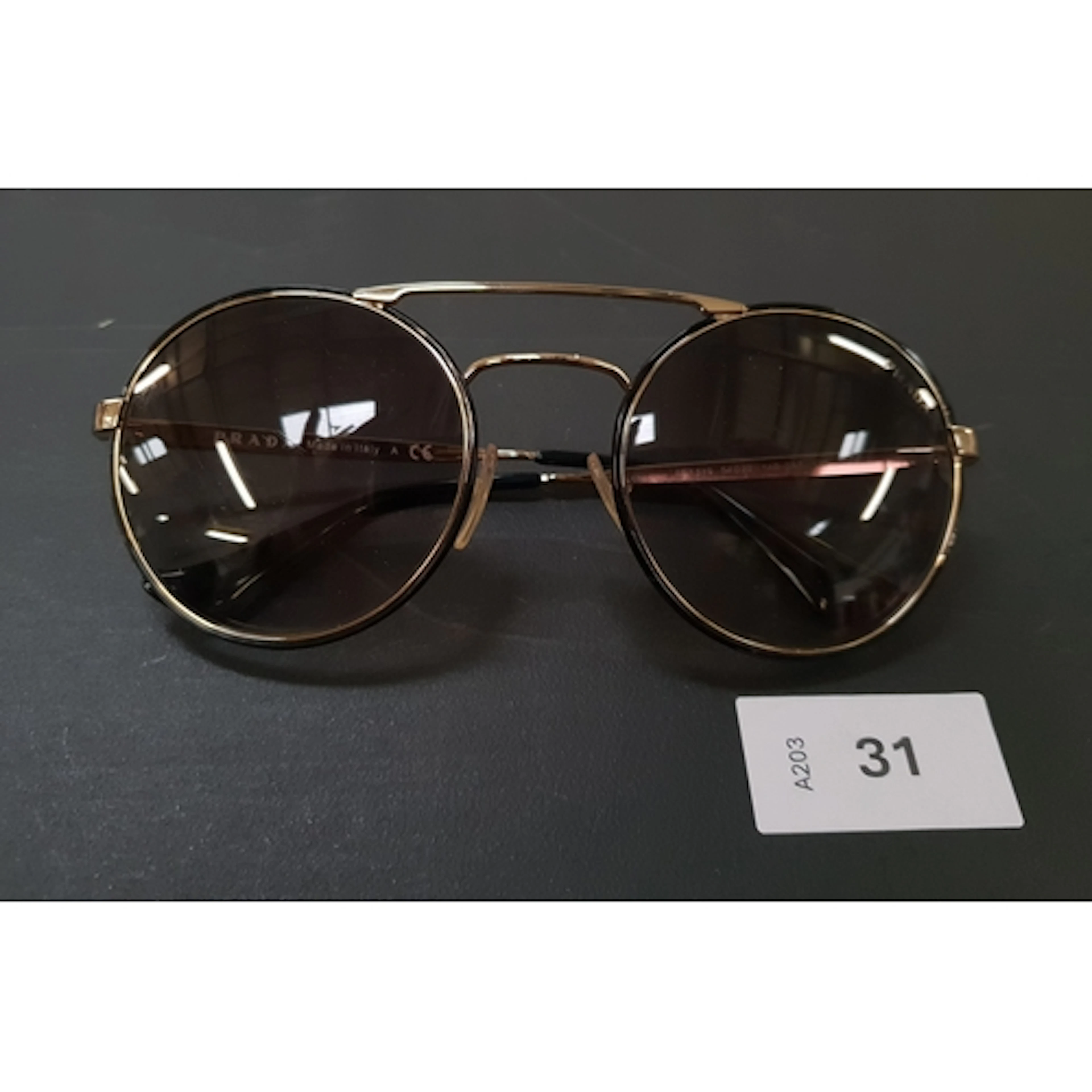 PAIR OF SUNGLASSES PRADA ROUND SPR51S