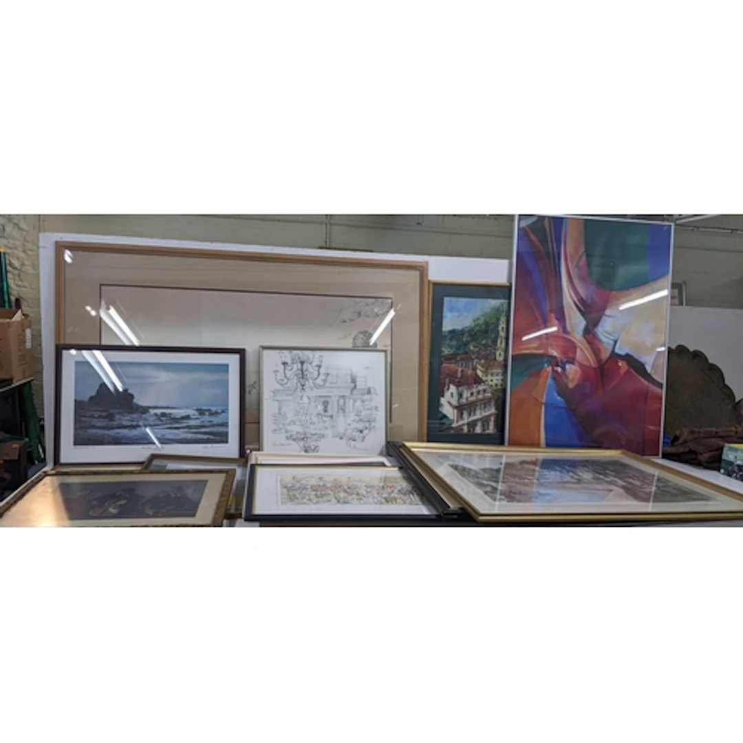 A collection of wall-art to include a pastel featuring a gol...