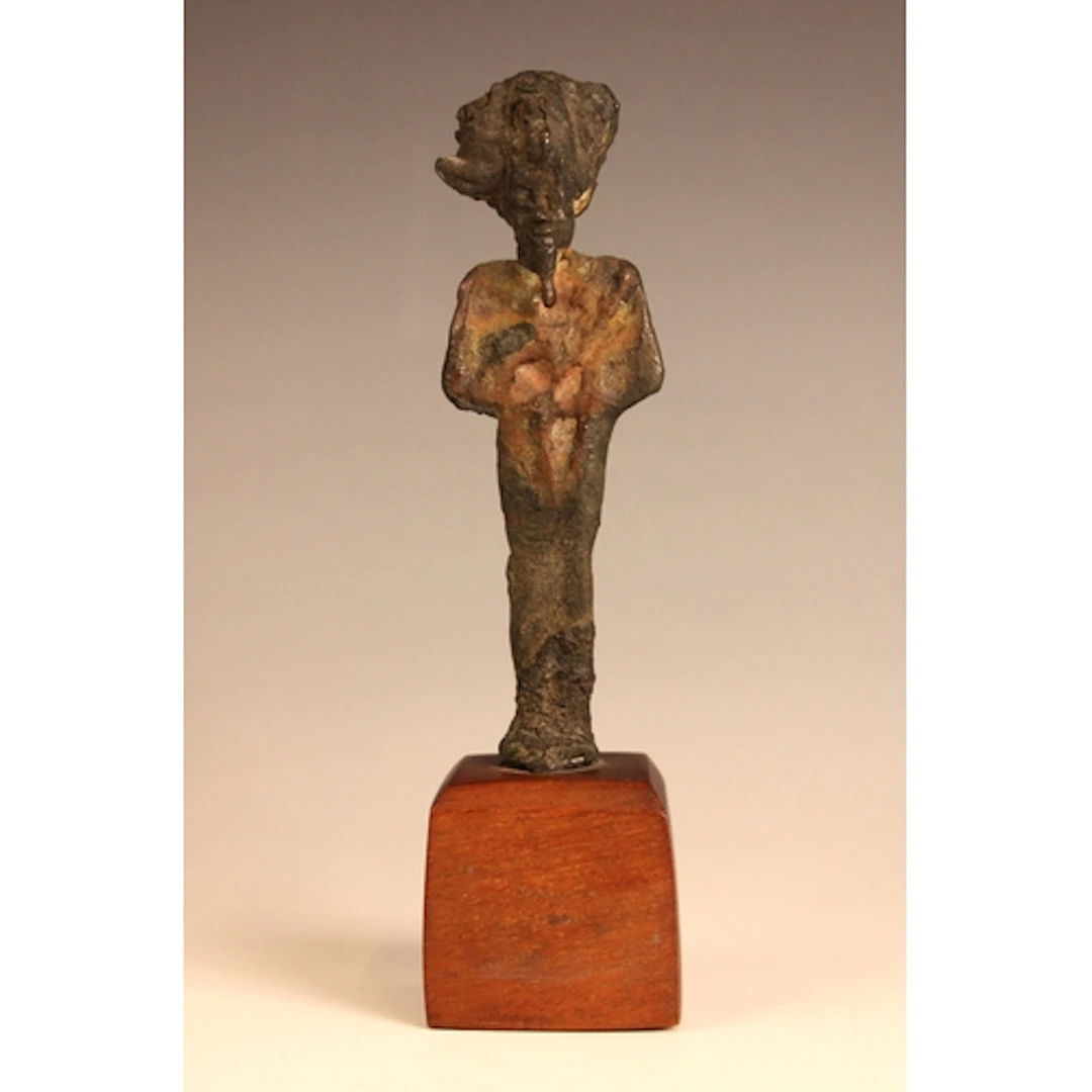 A bronze figure of the Egyptian god Osiris, modelled in mumm...
