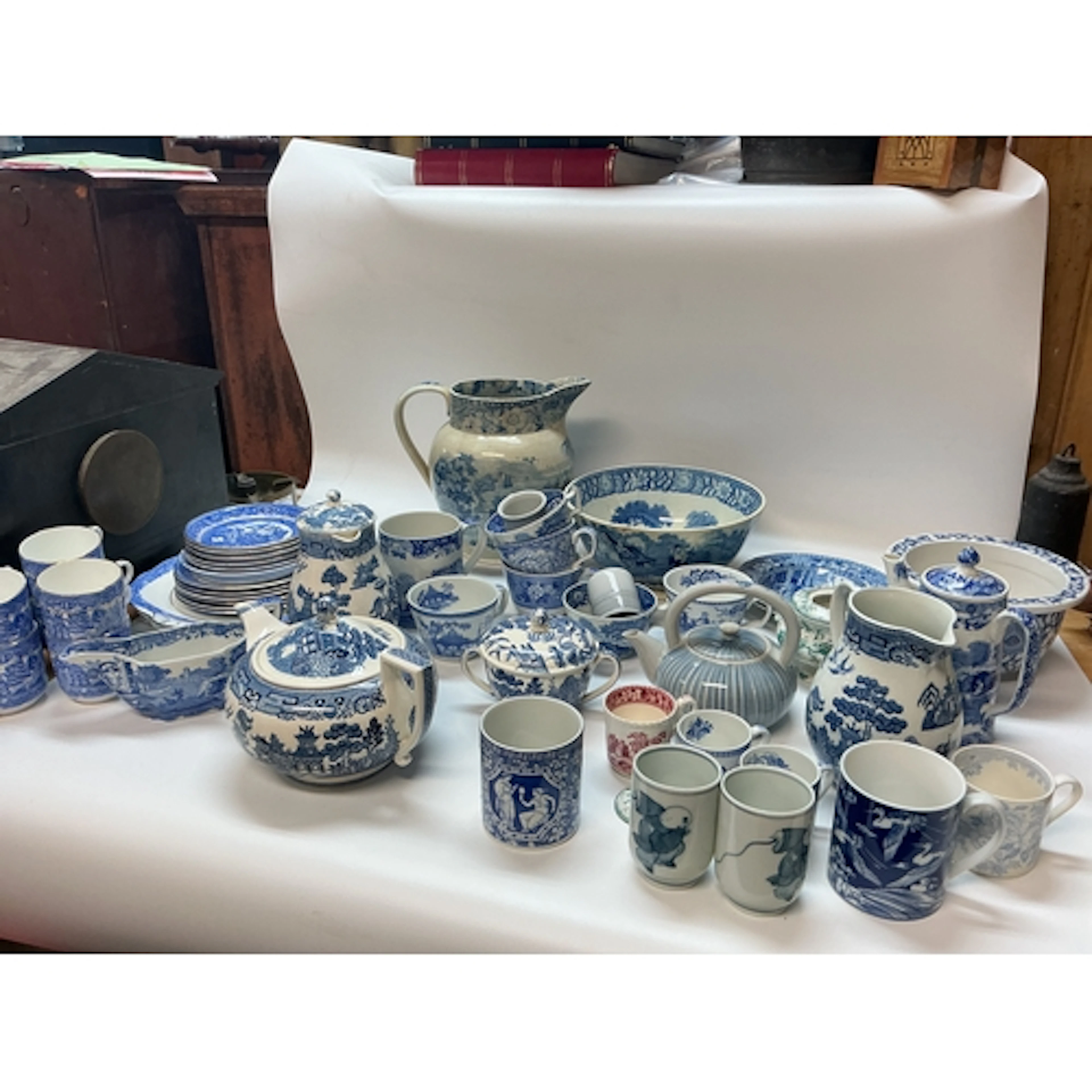 A collection of blue and white ceramics including plates, cu...
