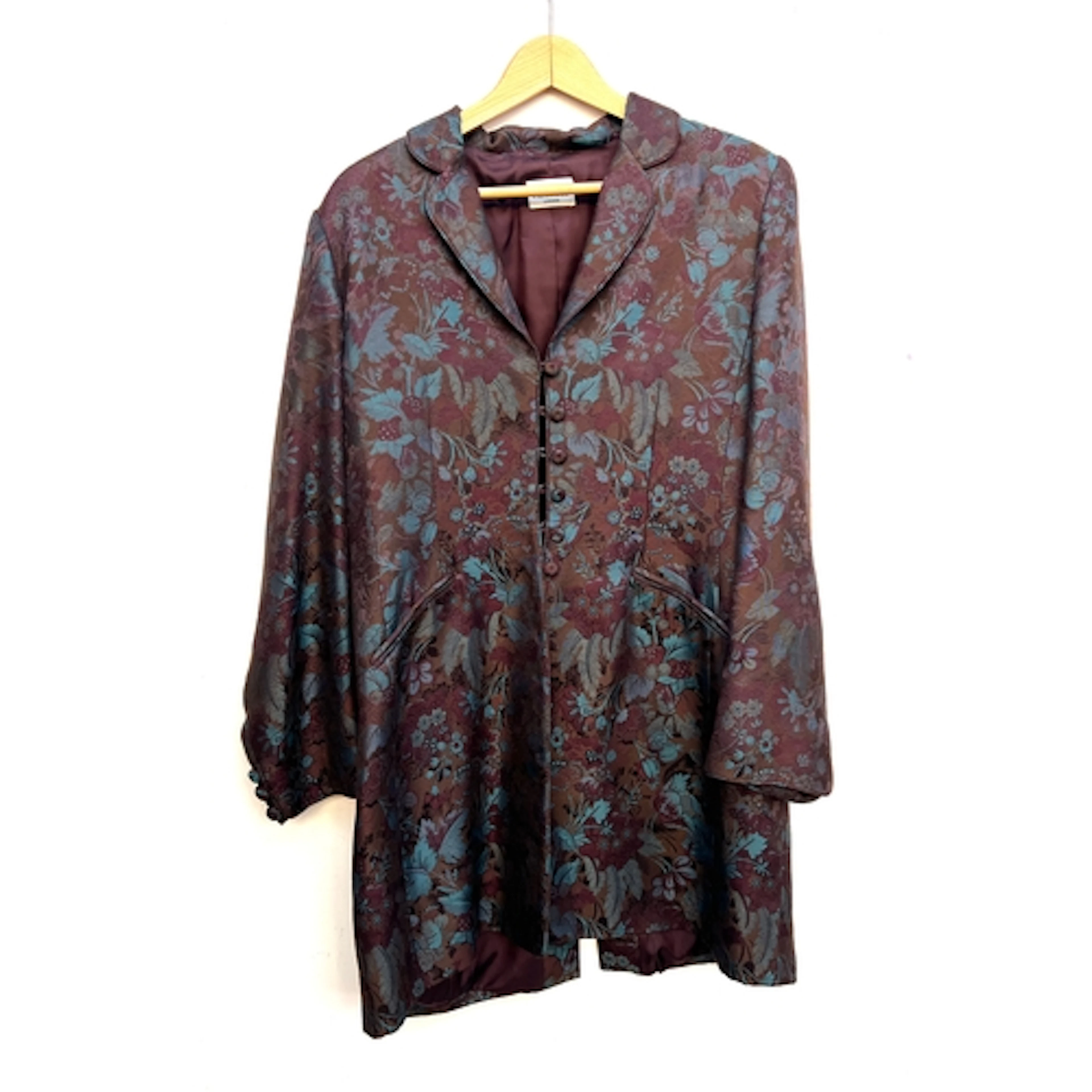 A Caroline Charles brown and blue floral print jacket with f...