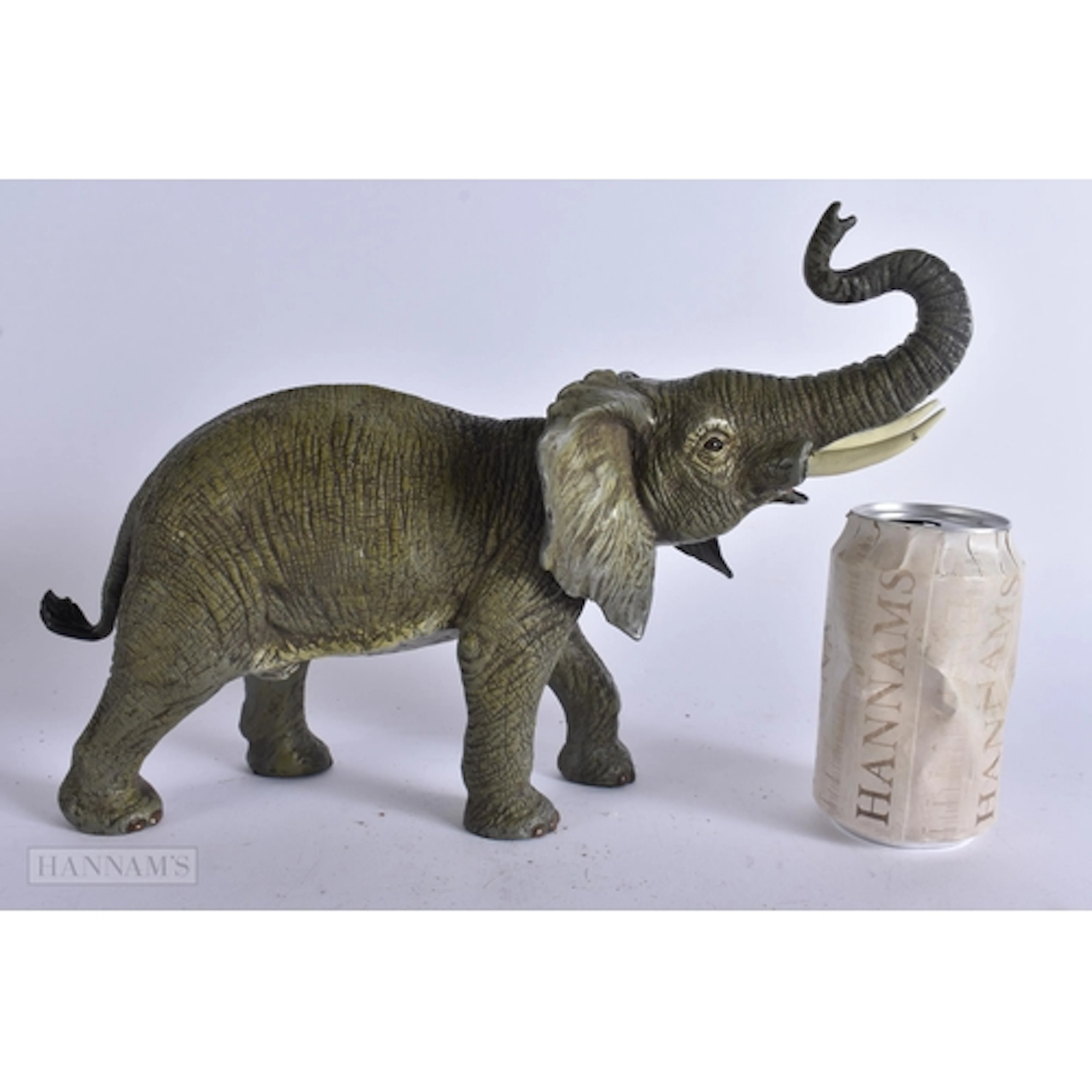 A COLD PAINTED BRONZE ELEPHANT. 34 cm x 22 cm.