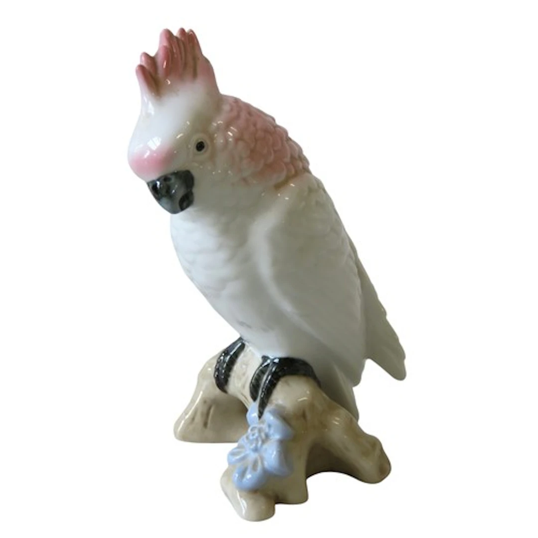A SMALL ROYAL DUX PORCELAIN MODEL OF A COCKATOO modelled per...