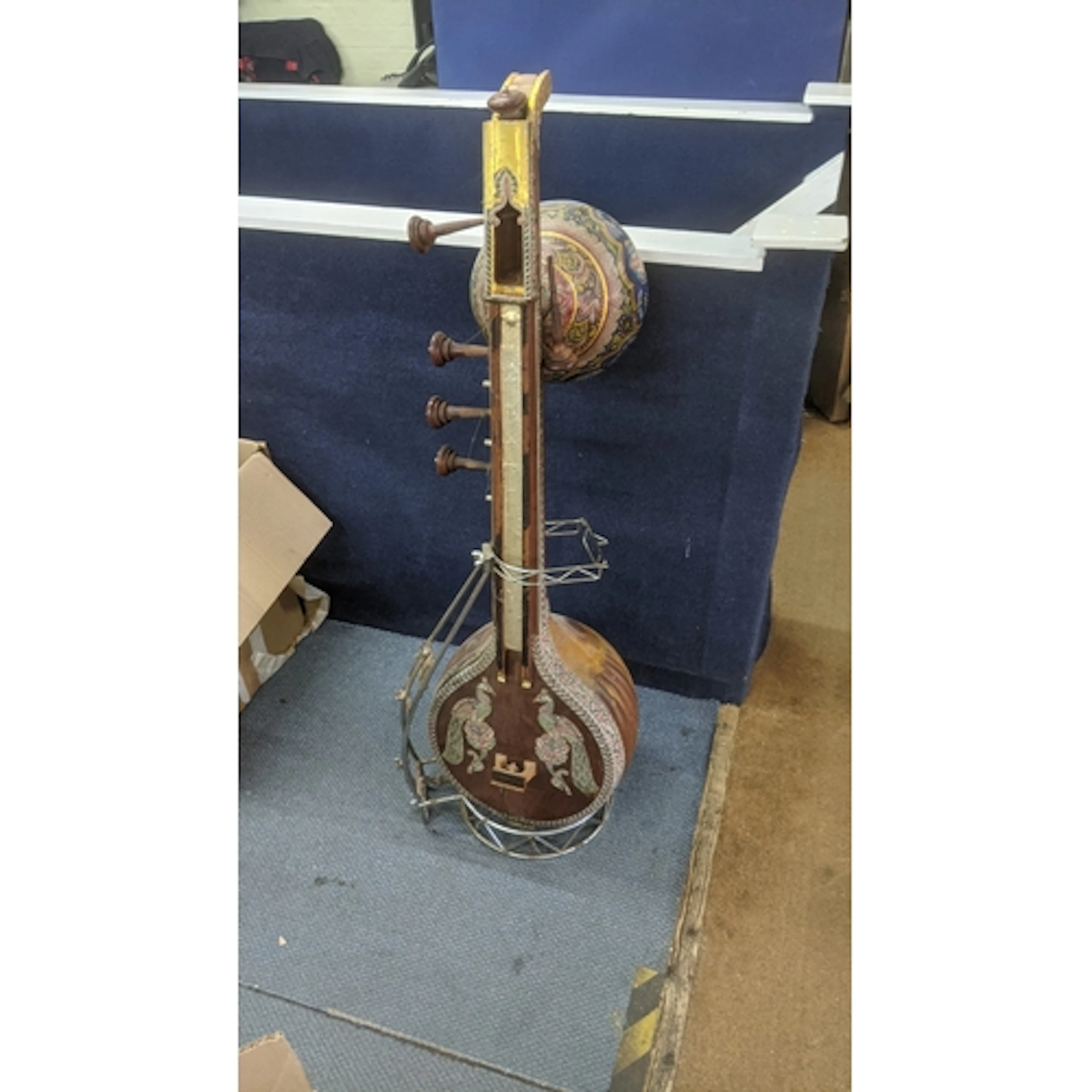 An Indian Double Tumba sitar having hand painted panels and ...