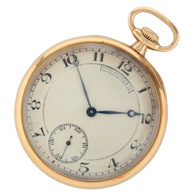 A late 1930's 18kt Patek Philippe open faced keyless dress p...