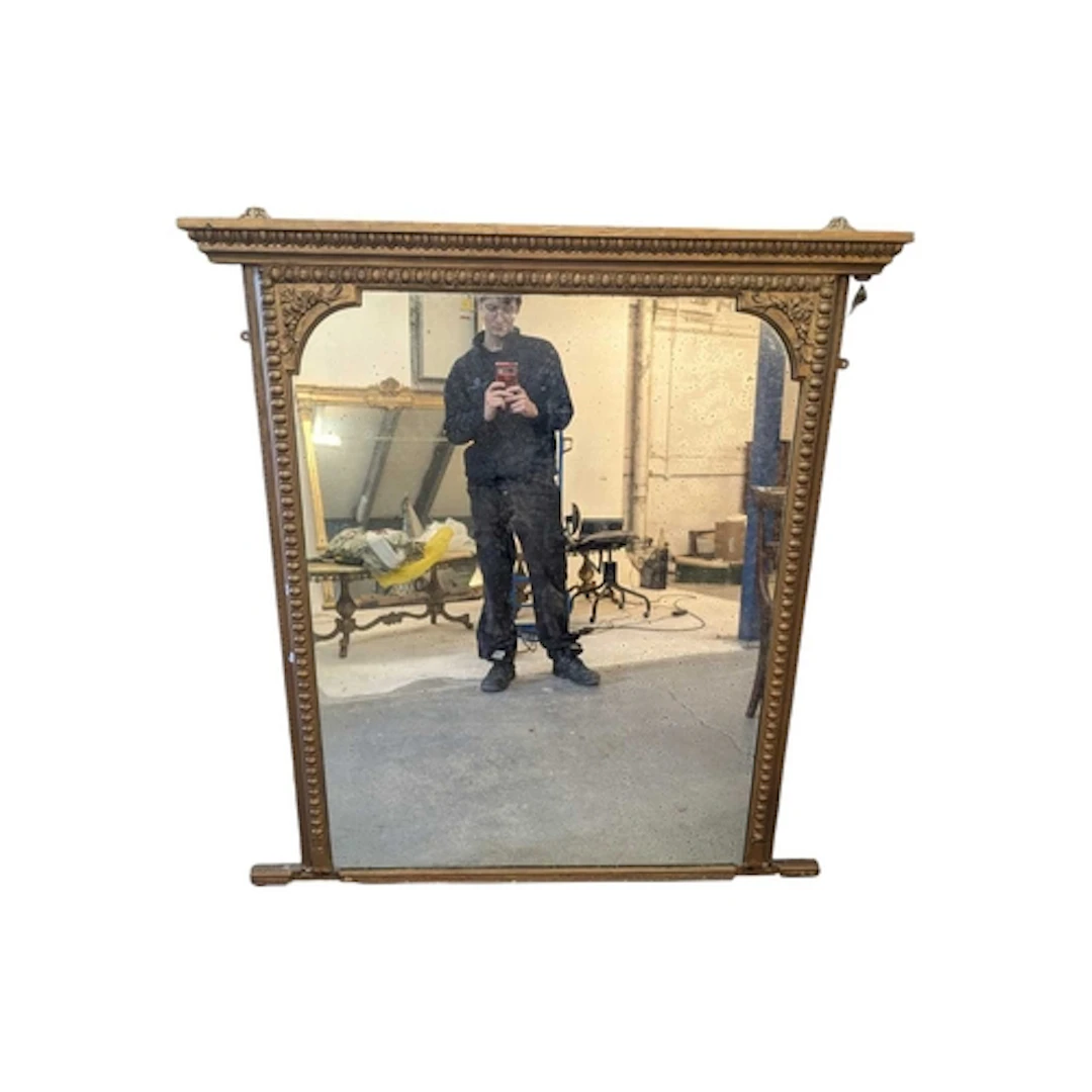 A 19th century gilt wood and gesso worked overmantel mirror....