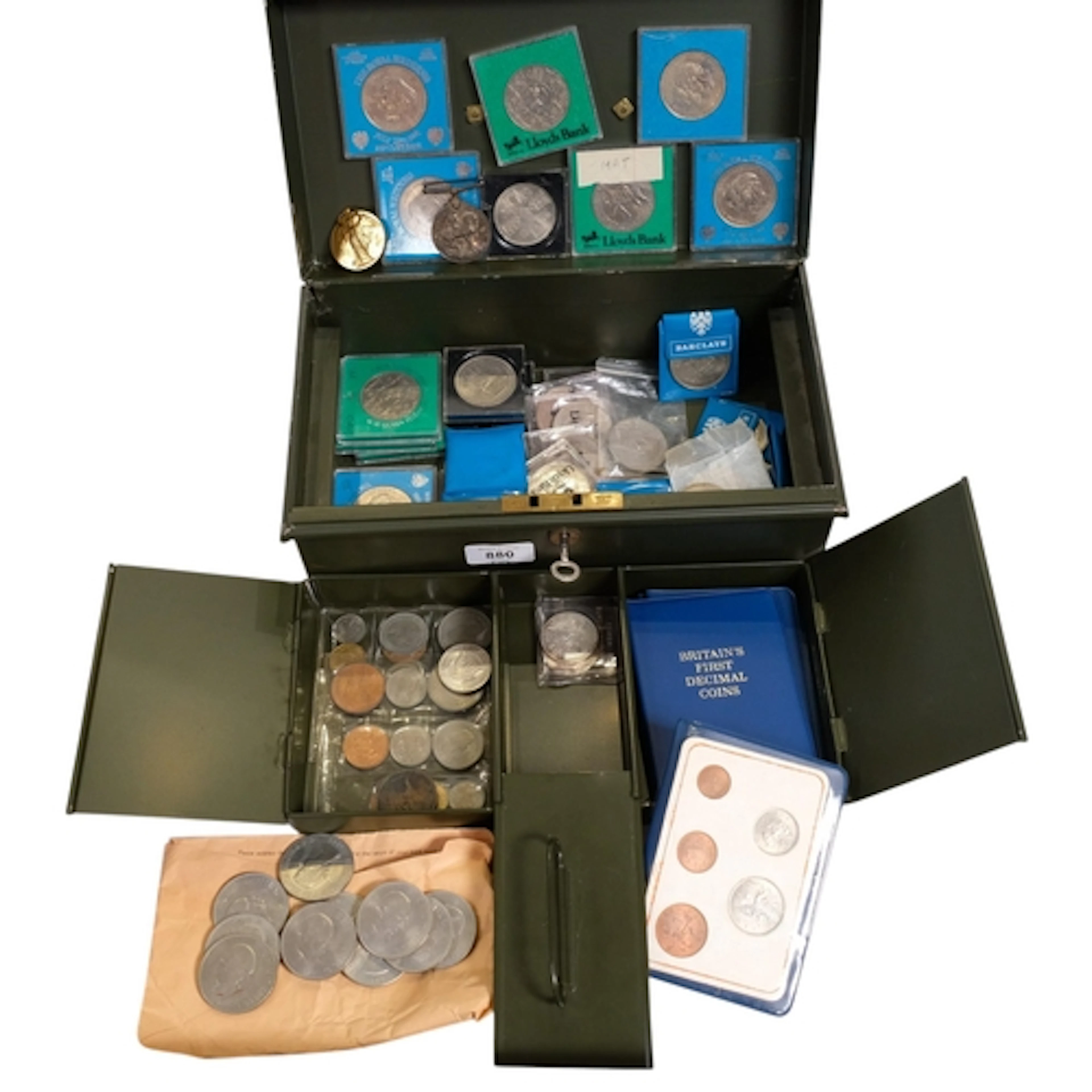 A safety deposit box, containing a quantity of commemorative...