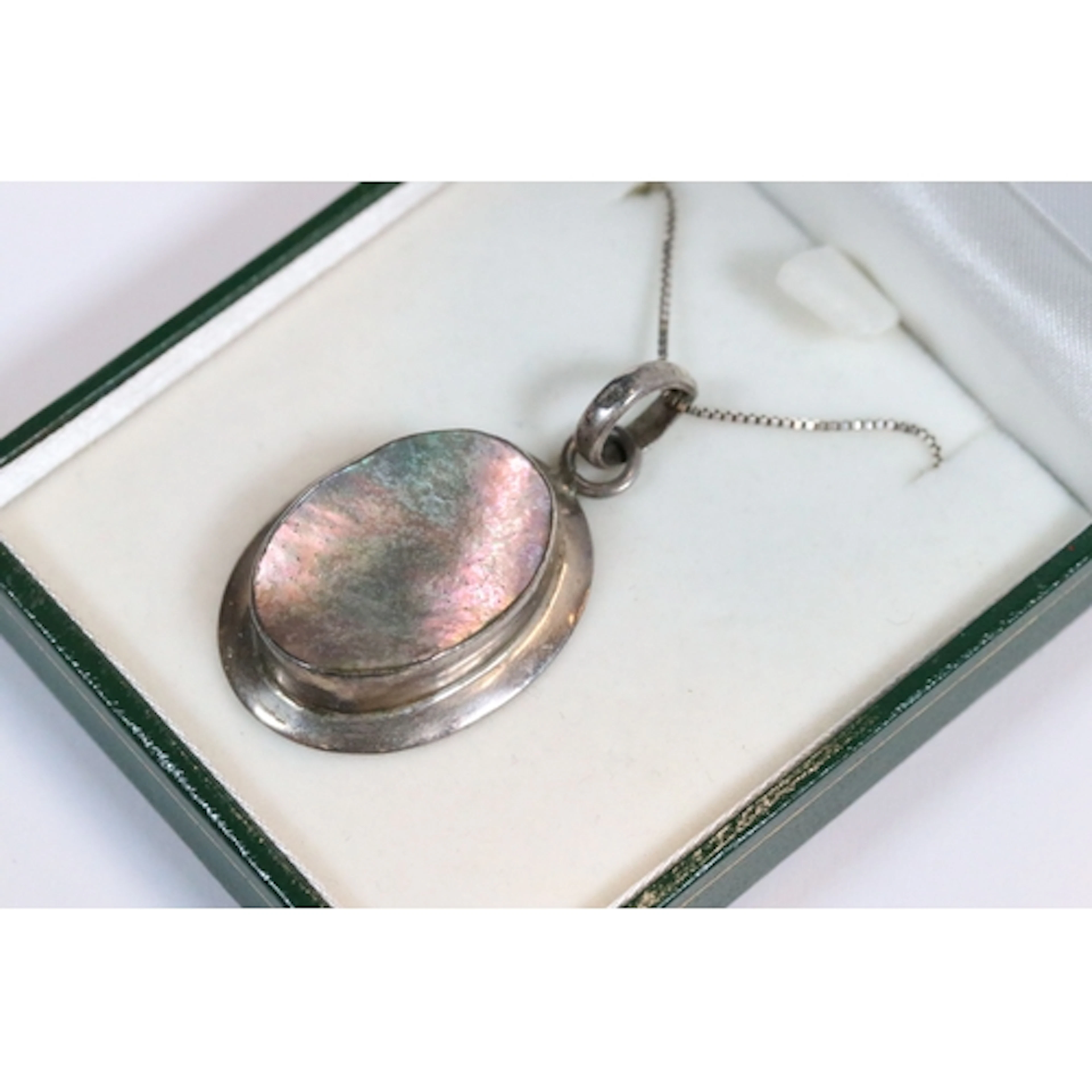 A contemporary sterling silver necklace and pendant, a penda...