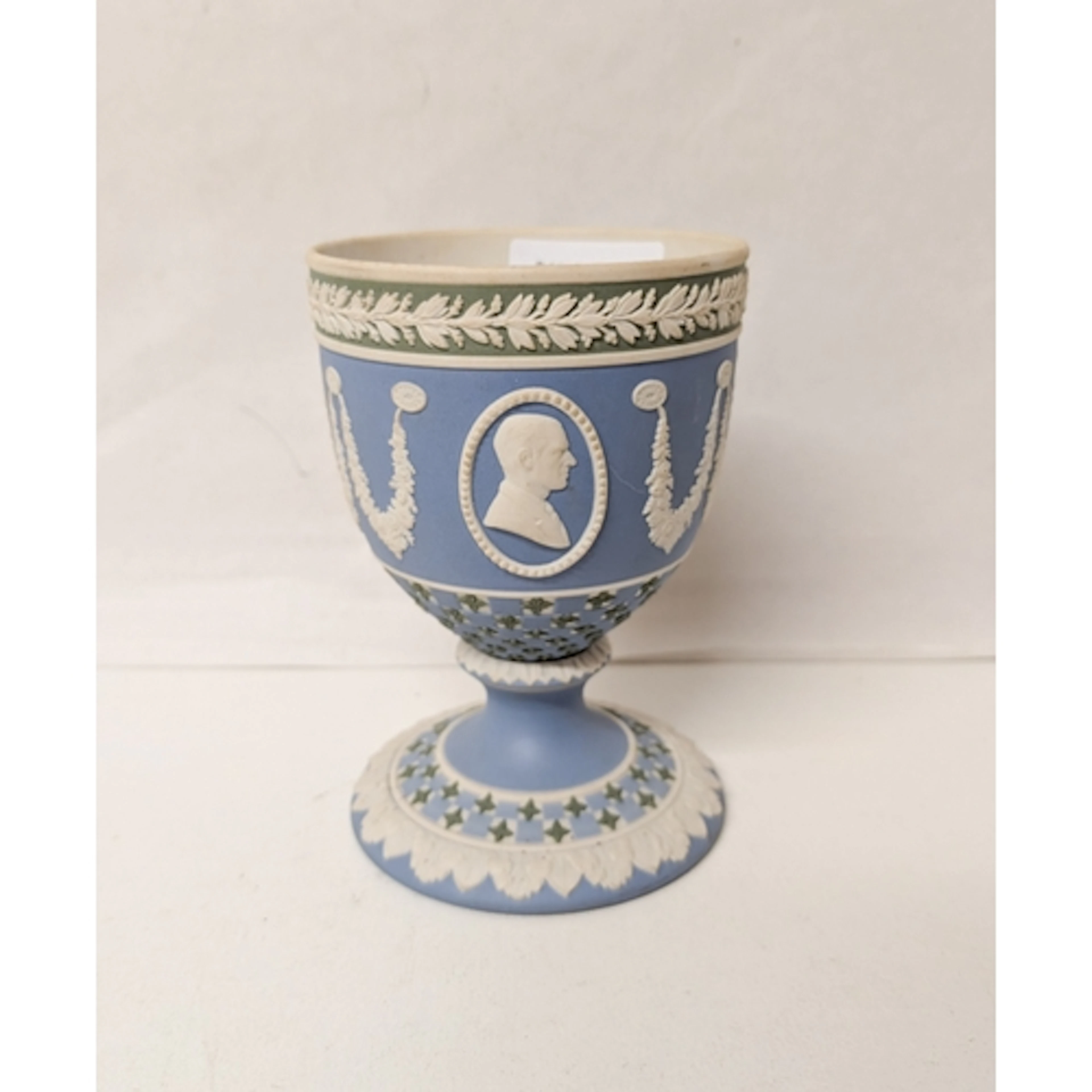 A Wedgwood tri colour Jasperware Silver Jubilee Queen Elizab...