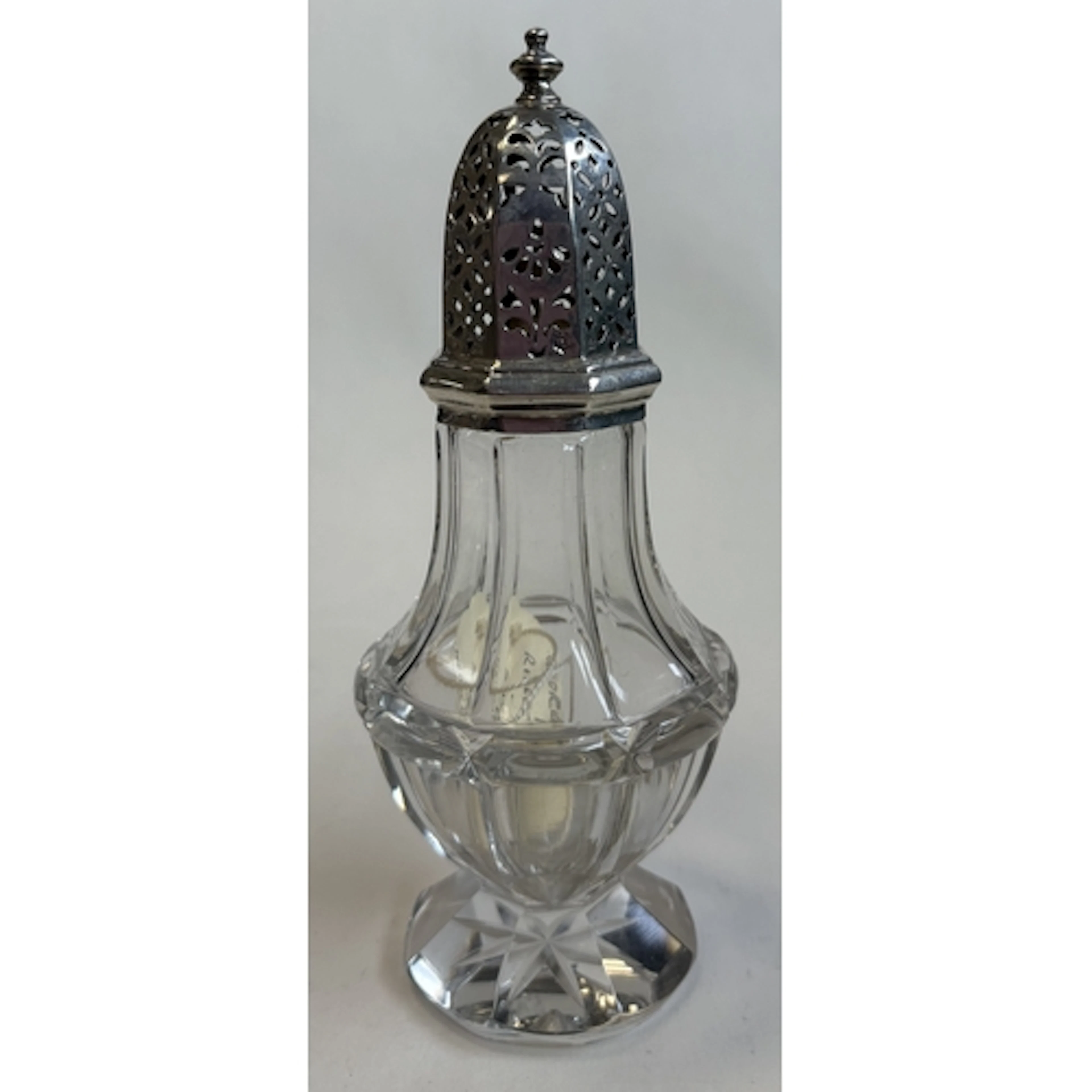 A silver-mounted glass sugar caster in the Georgian style. B...