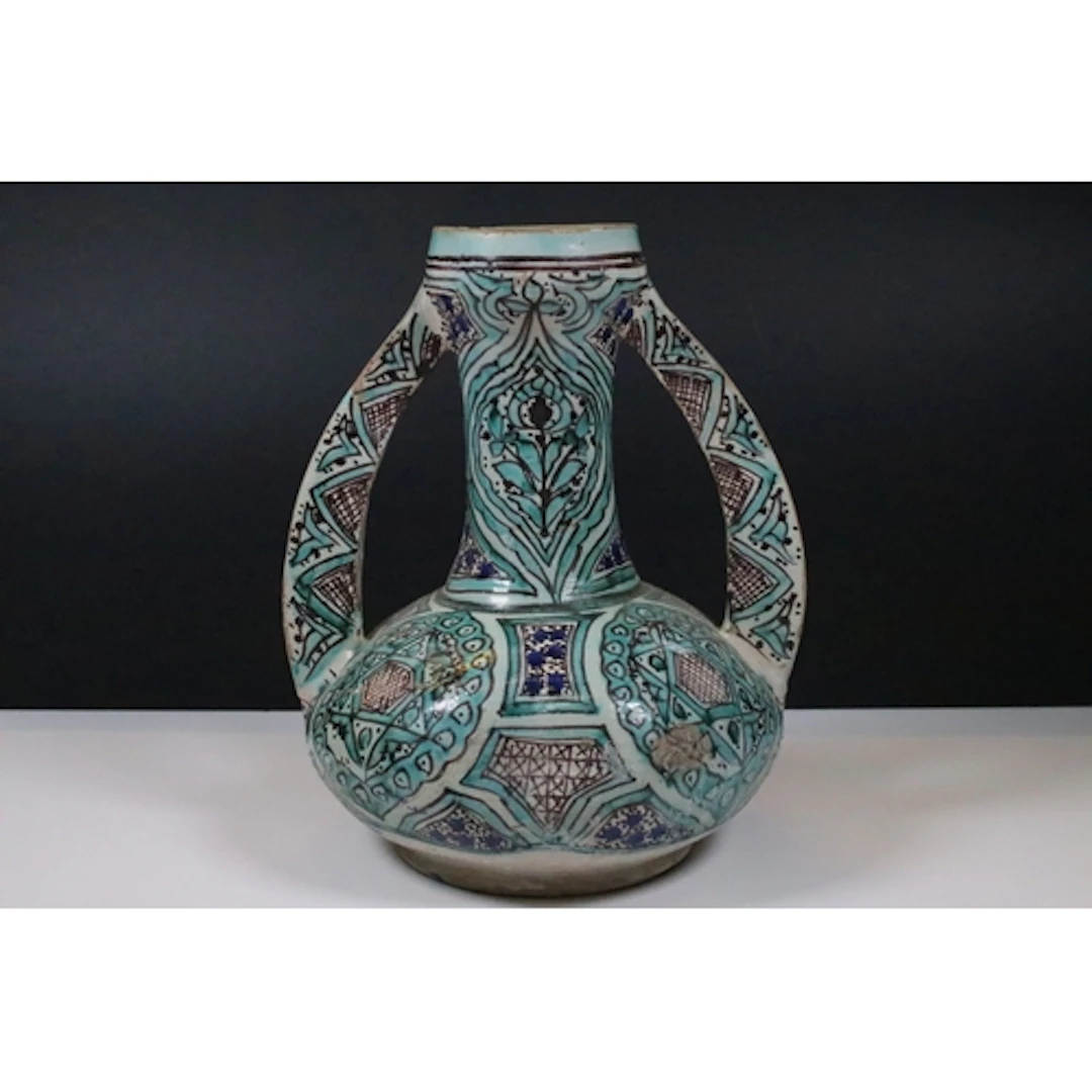 Early 20th century Persian pottery twin-handled baluster vas...