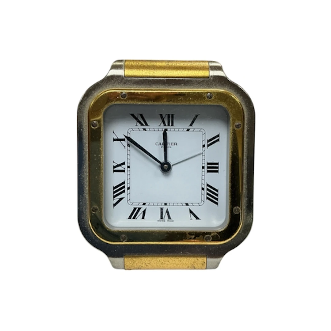 A Cartier Santos clock, ref. 7508, no. 18779, 9 x 7.5cm....
