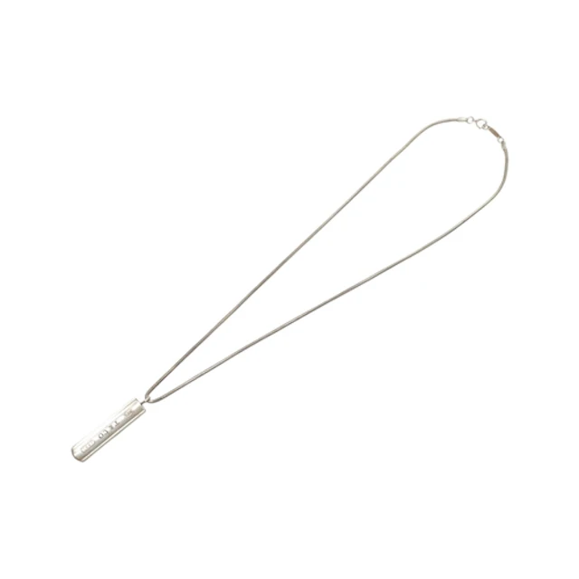 A Tiffany & Co silver ingot pendant, on a Tiffany & Co snake...