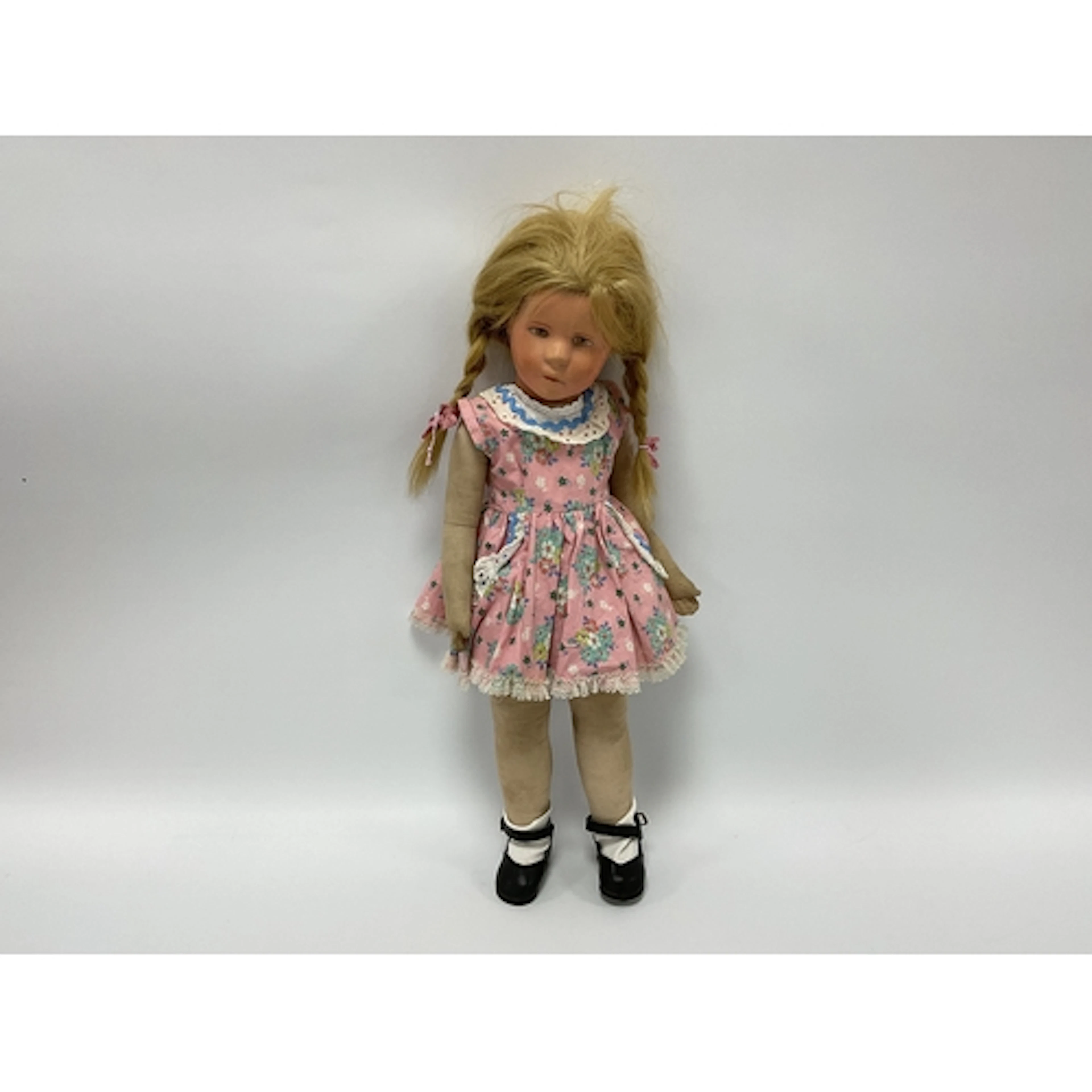 A Kathe Kruse Doll, with painted hard plastic swivel head, b...