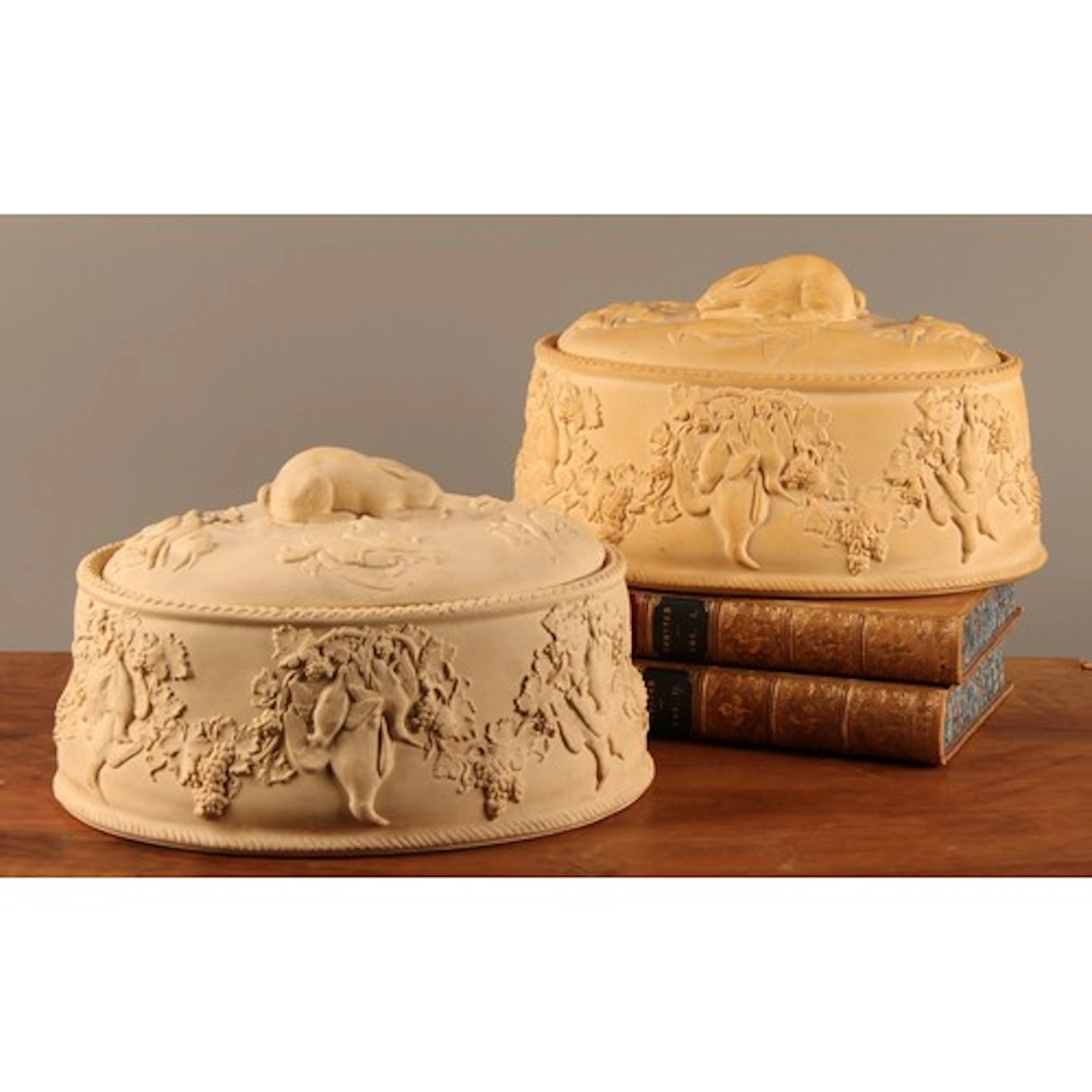 A near pair of Victorian Wedgwood caneware oval game pie dis...