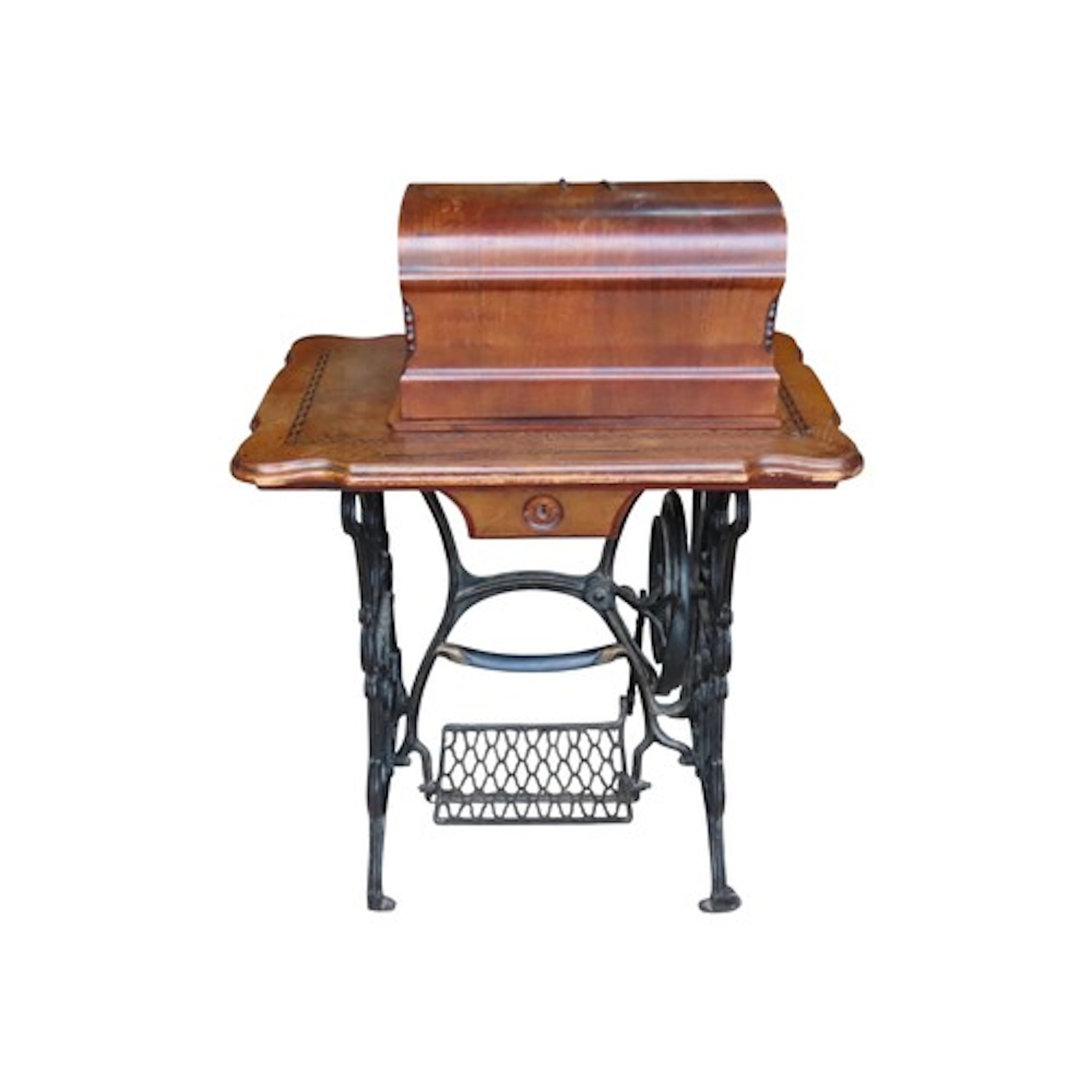 A Harris's treadle sewing machine with decorative inlaid det...