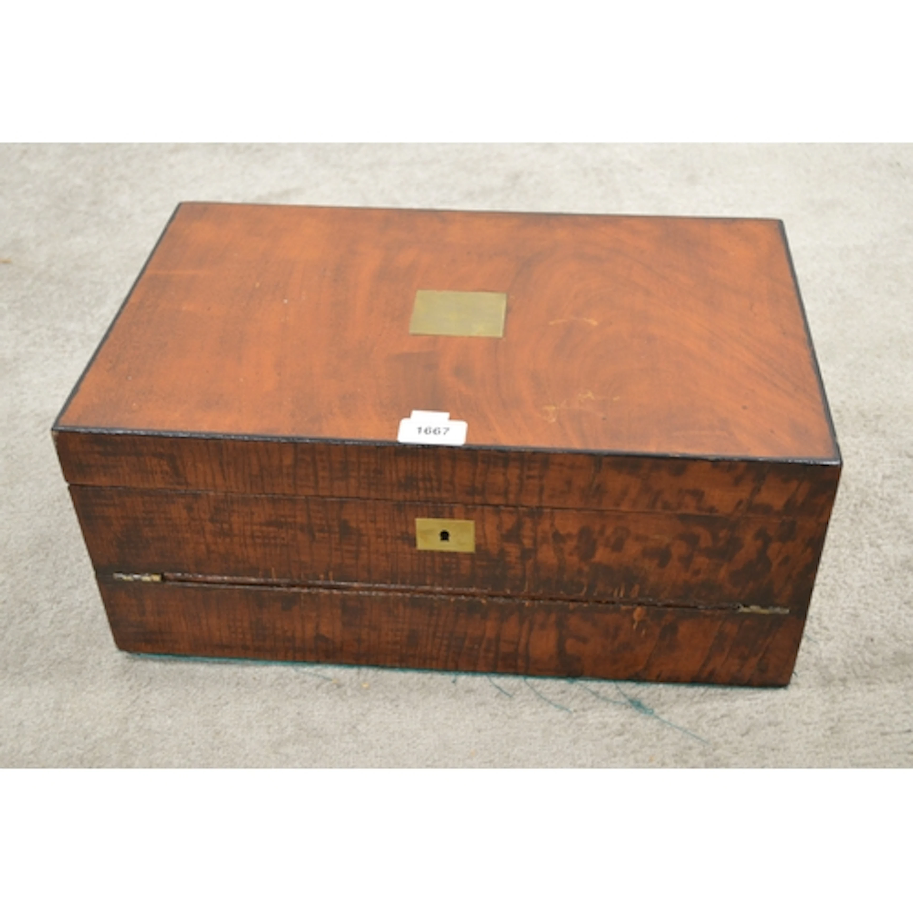 Mahogany double fold over writing slope, with fitted interio...