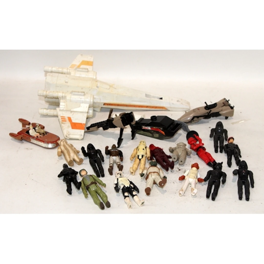 A collection of vintage play worn Star Wars figures