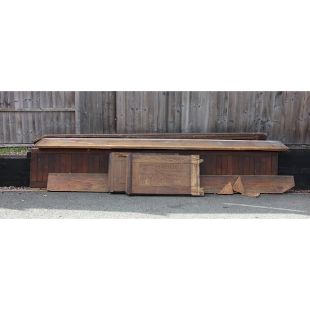 A large Victorian oak church pew, with panelled back, solid ...