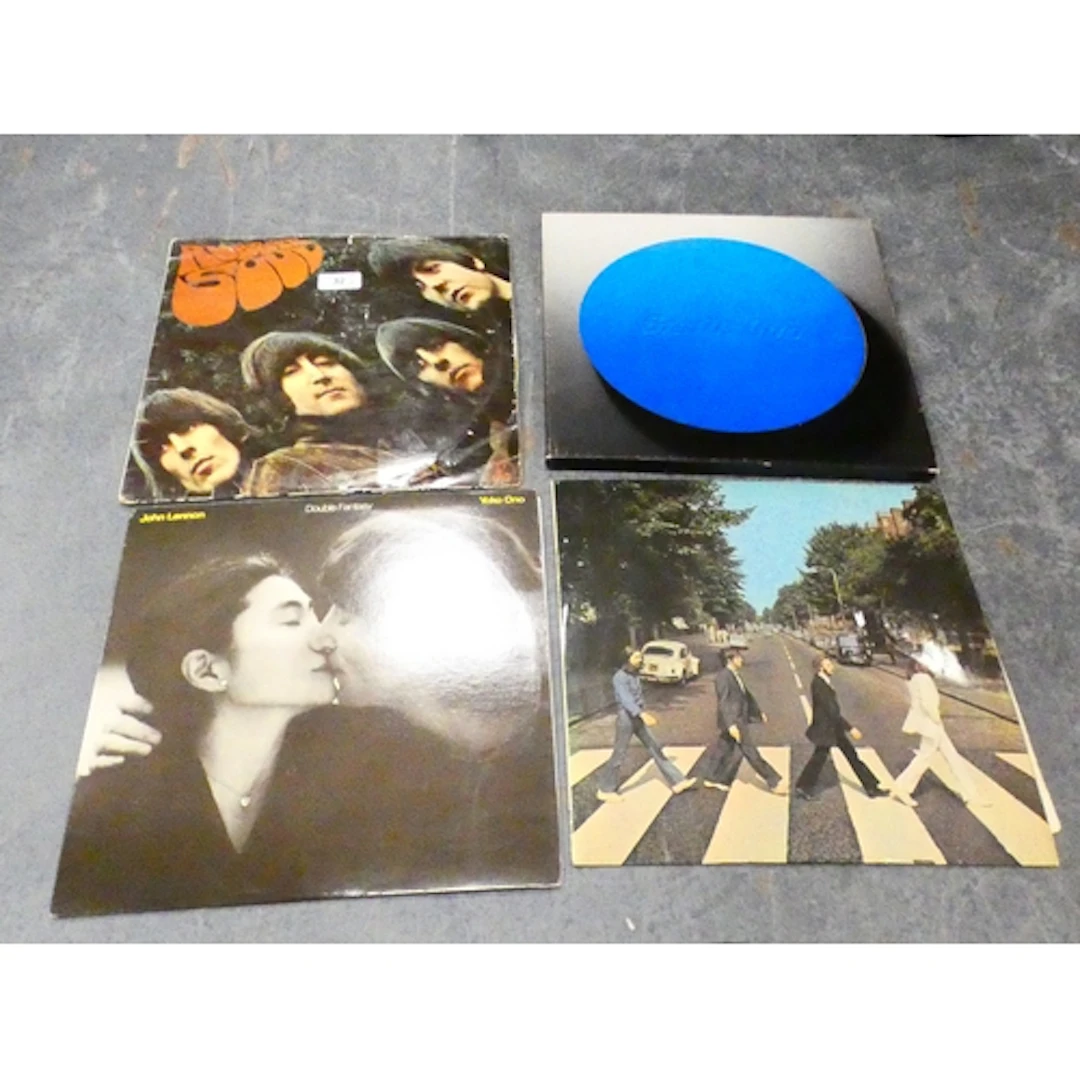Collection of pop and rock related vinyl albums to include T...