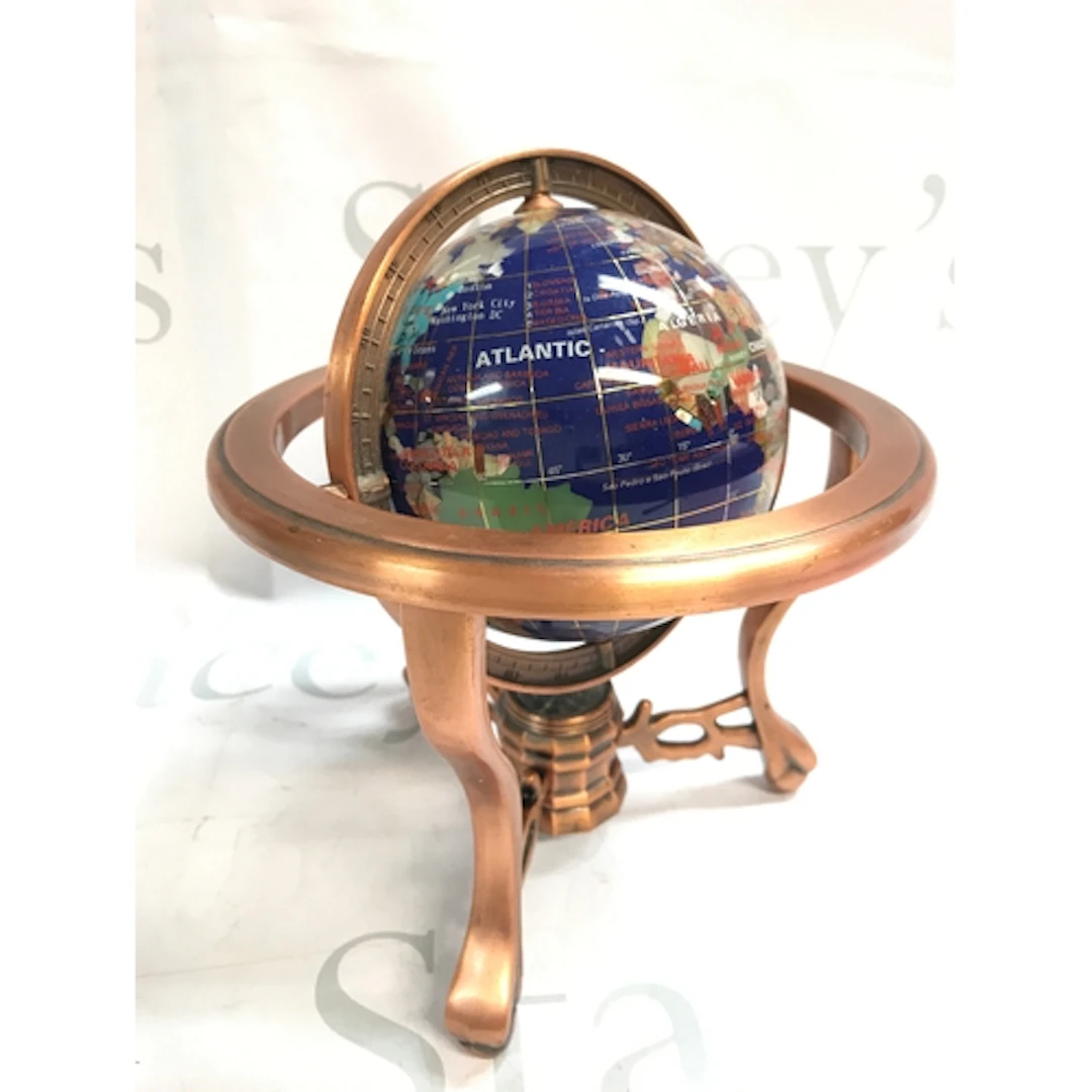 A gem stone globe , 22cm tall