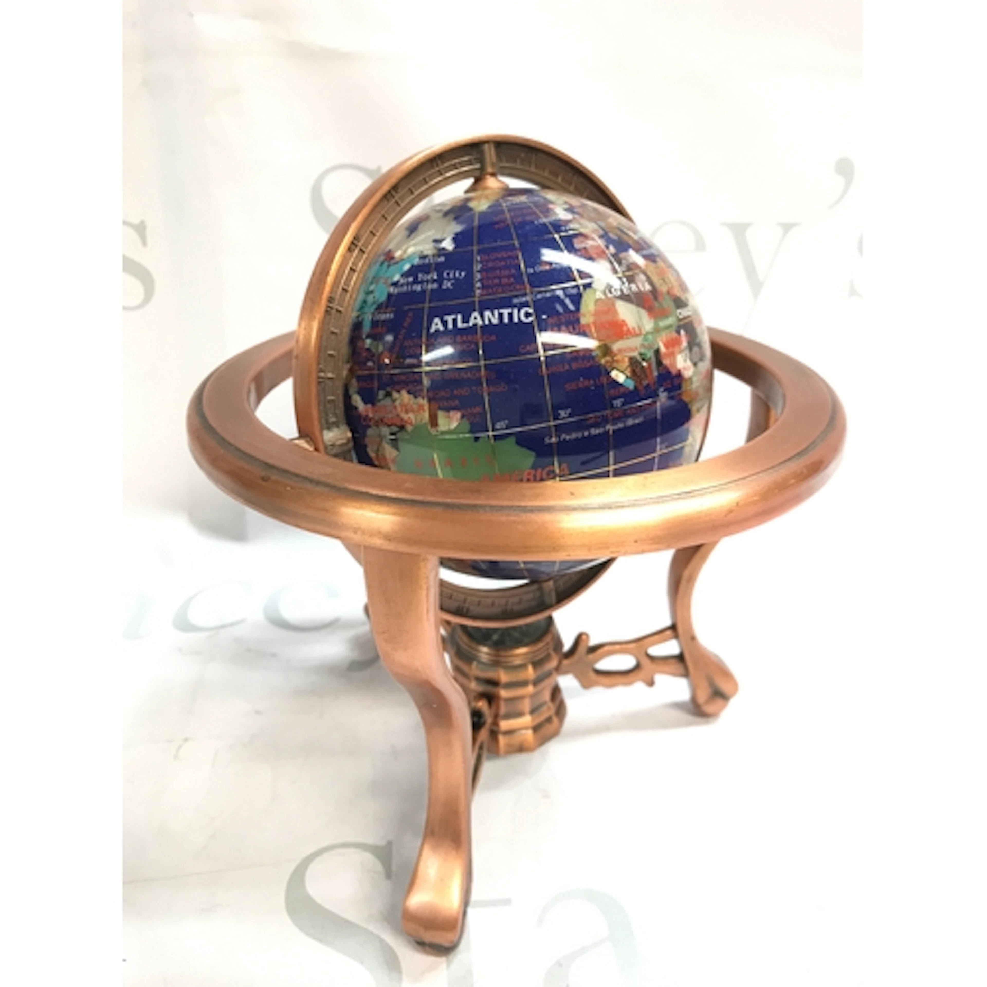 A gem stone globe , 22cm tall