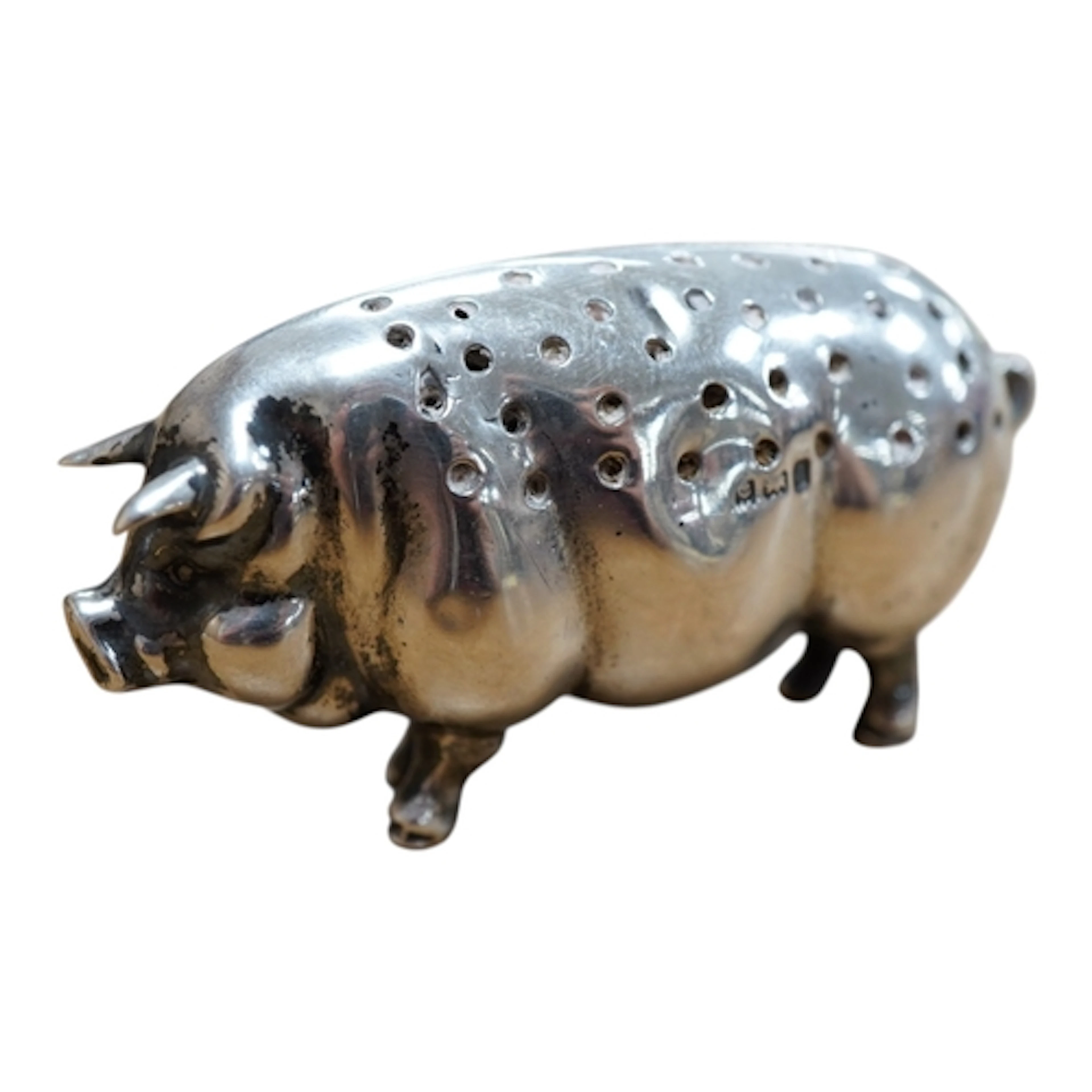 An Edwardian novelty silver mounted pin cushion, modelled as...