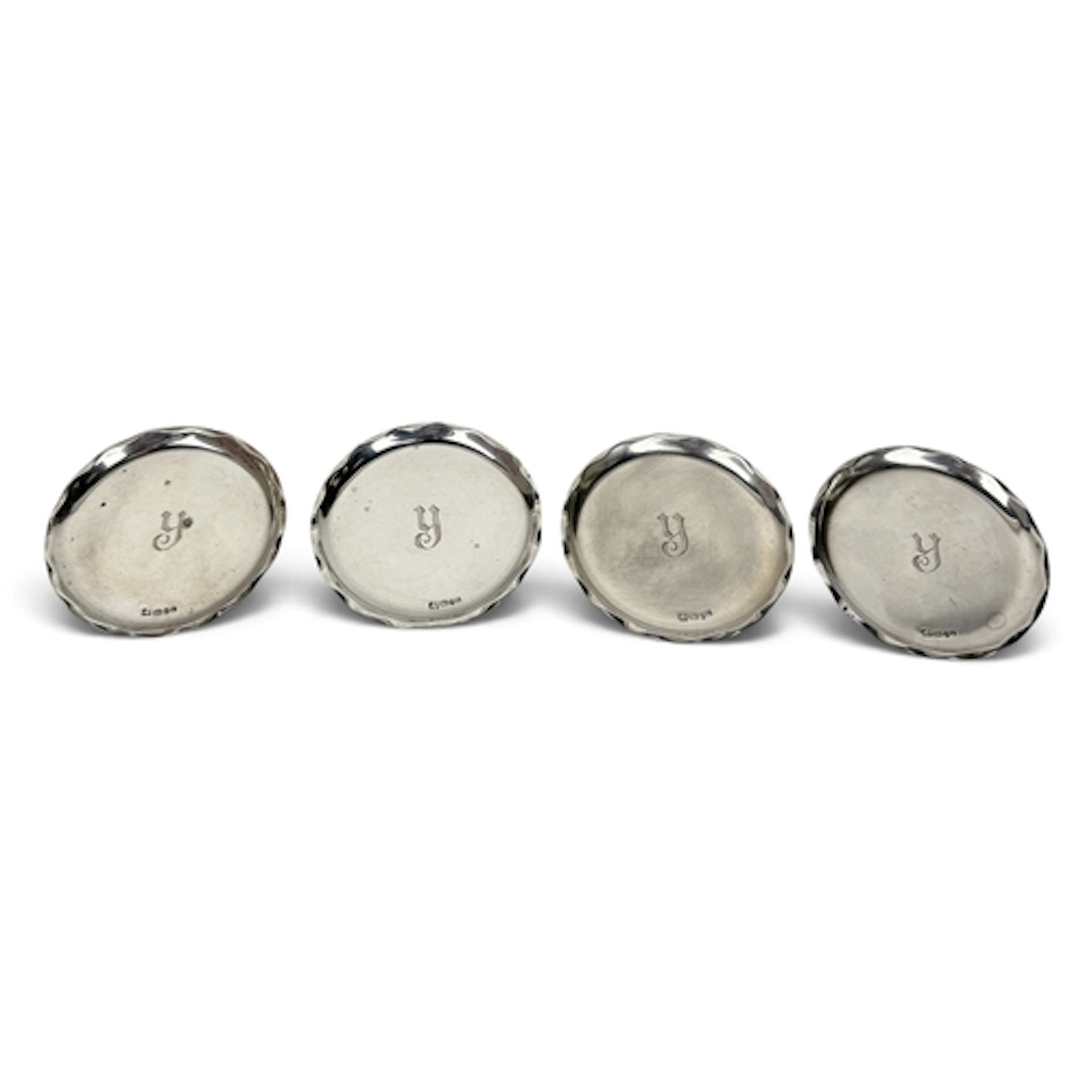 FOUR SILVER COASTERS Weight: 114gms
