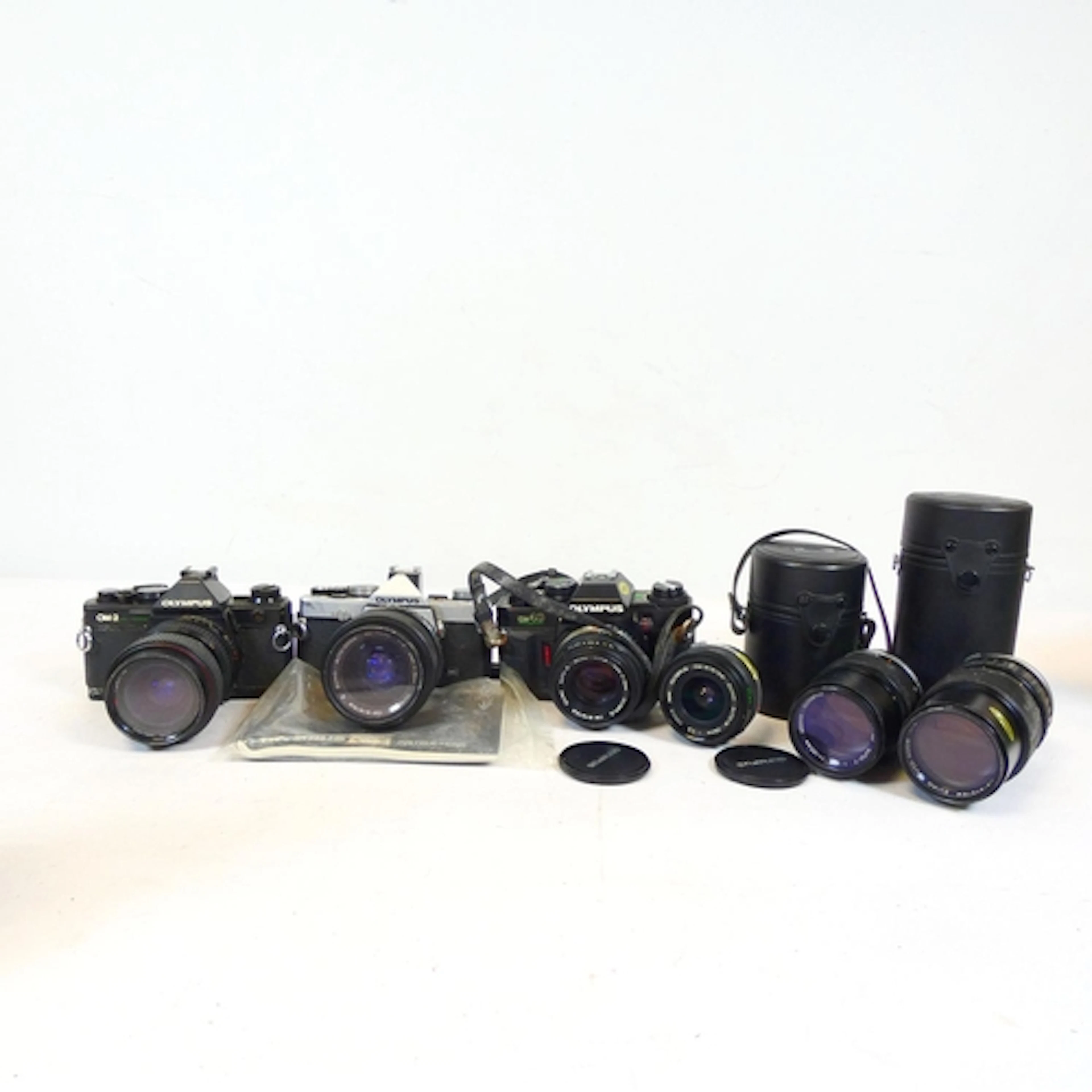 Olympus. An Olympus OM-1 35mm SLR camera fitted with an OM Z...