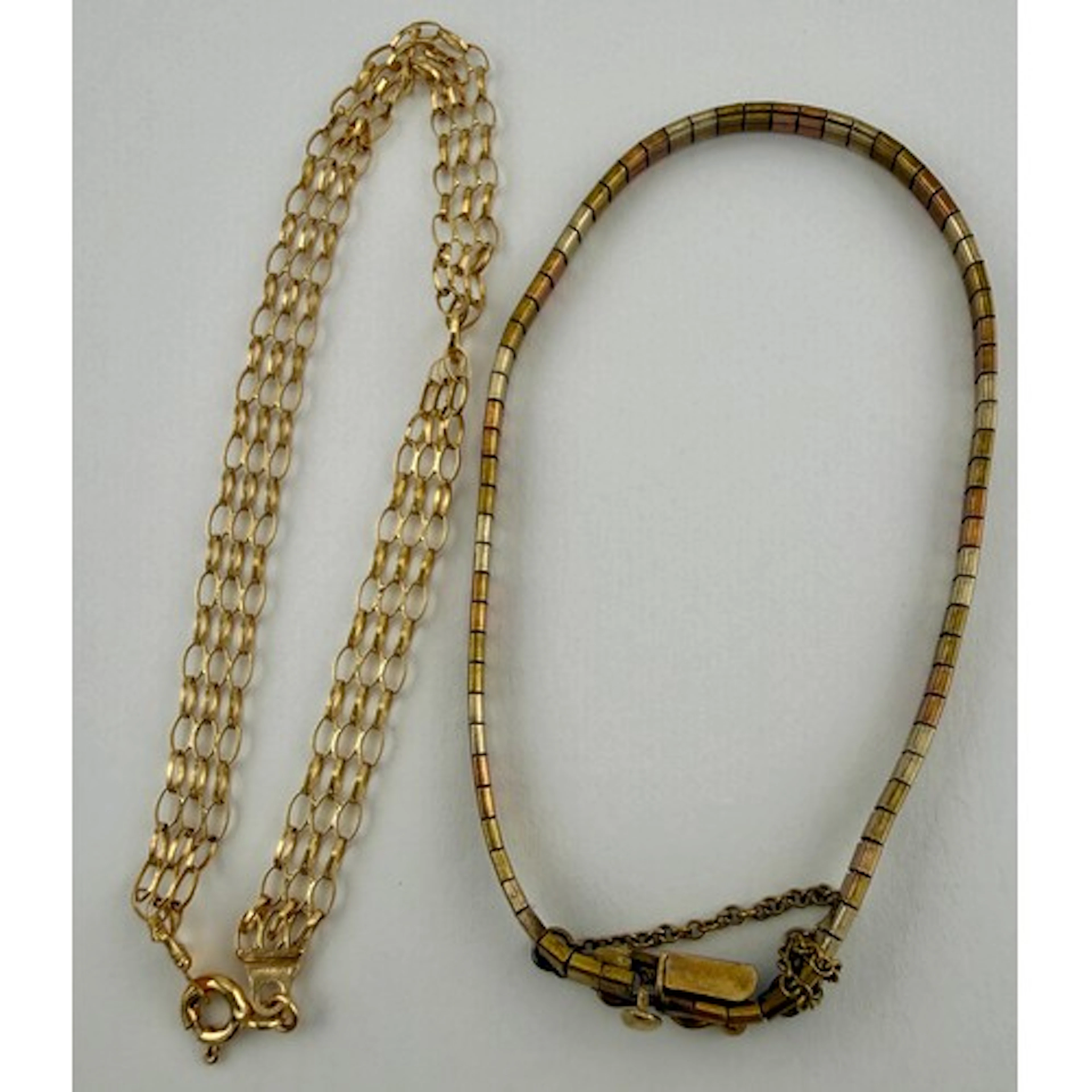 Two 9 carat gold bracelets including tri-colour. Total weigh...