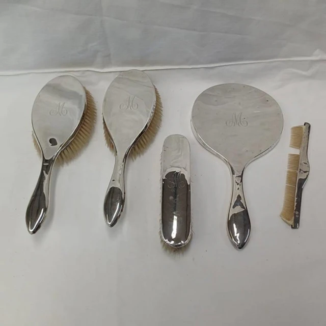 A 4 PIECE SILVER DRESSING SET INCLUDING 2 HAIRBRUSHES, HAND ...