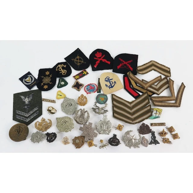 A collection of British Army cap badges, including Scottish ...