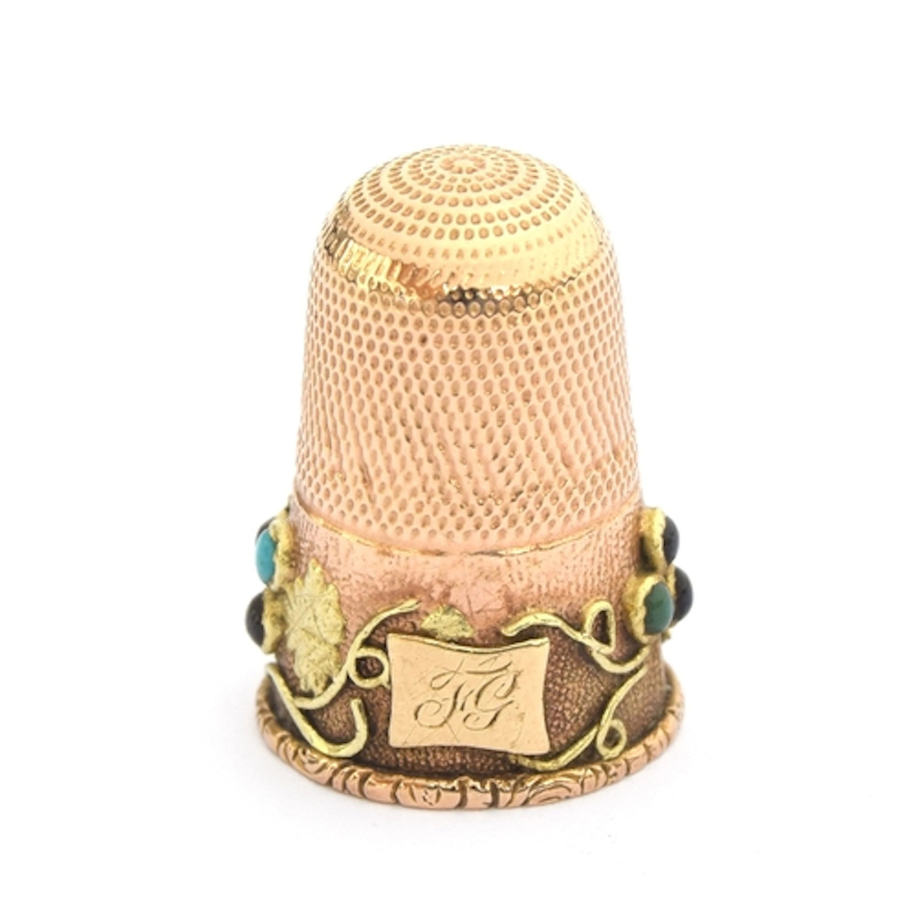 An early Victorian two colour gold thimble, encircling grape...