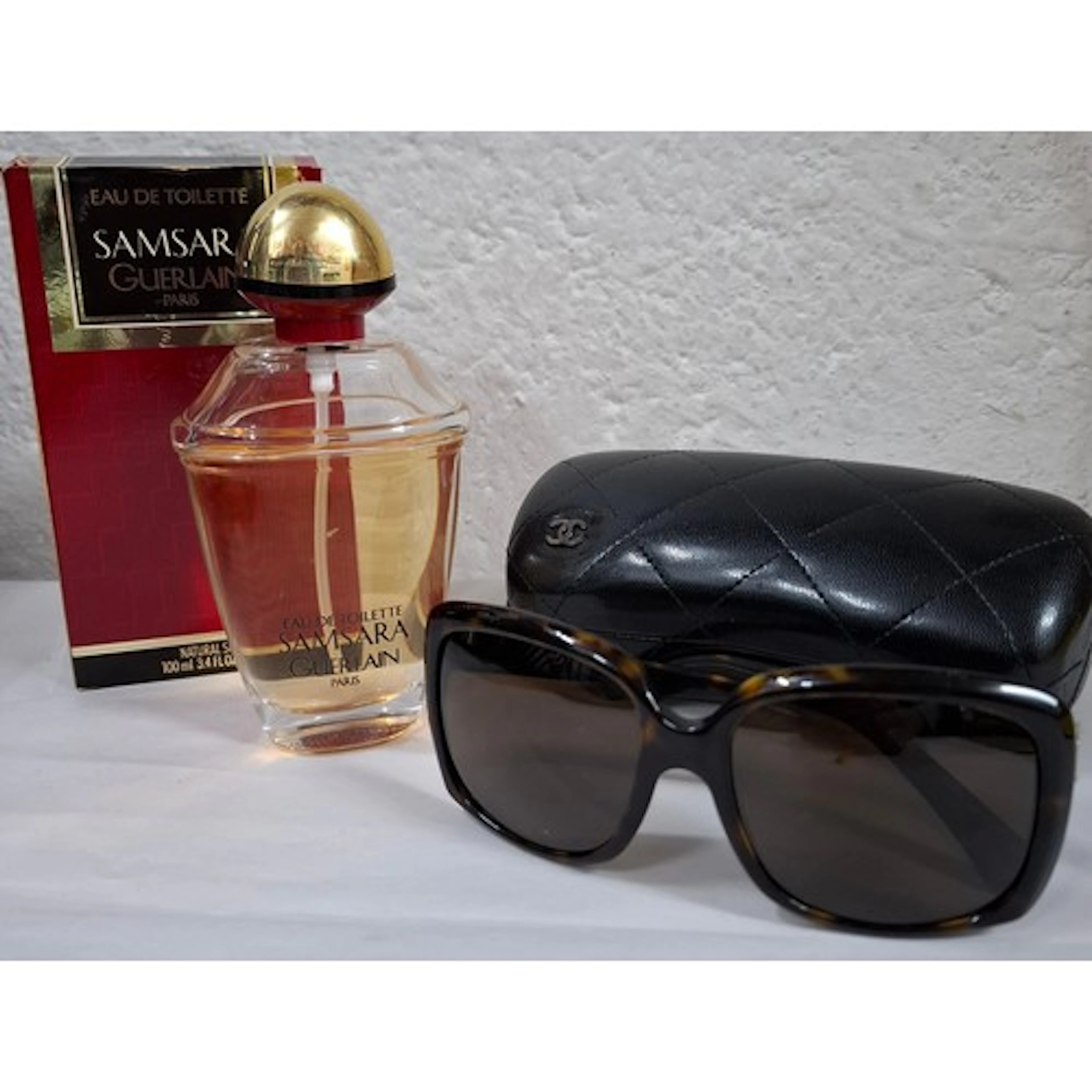 Guerlain and Emporio Armani- A pair of vintage Armani brown ...