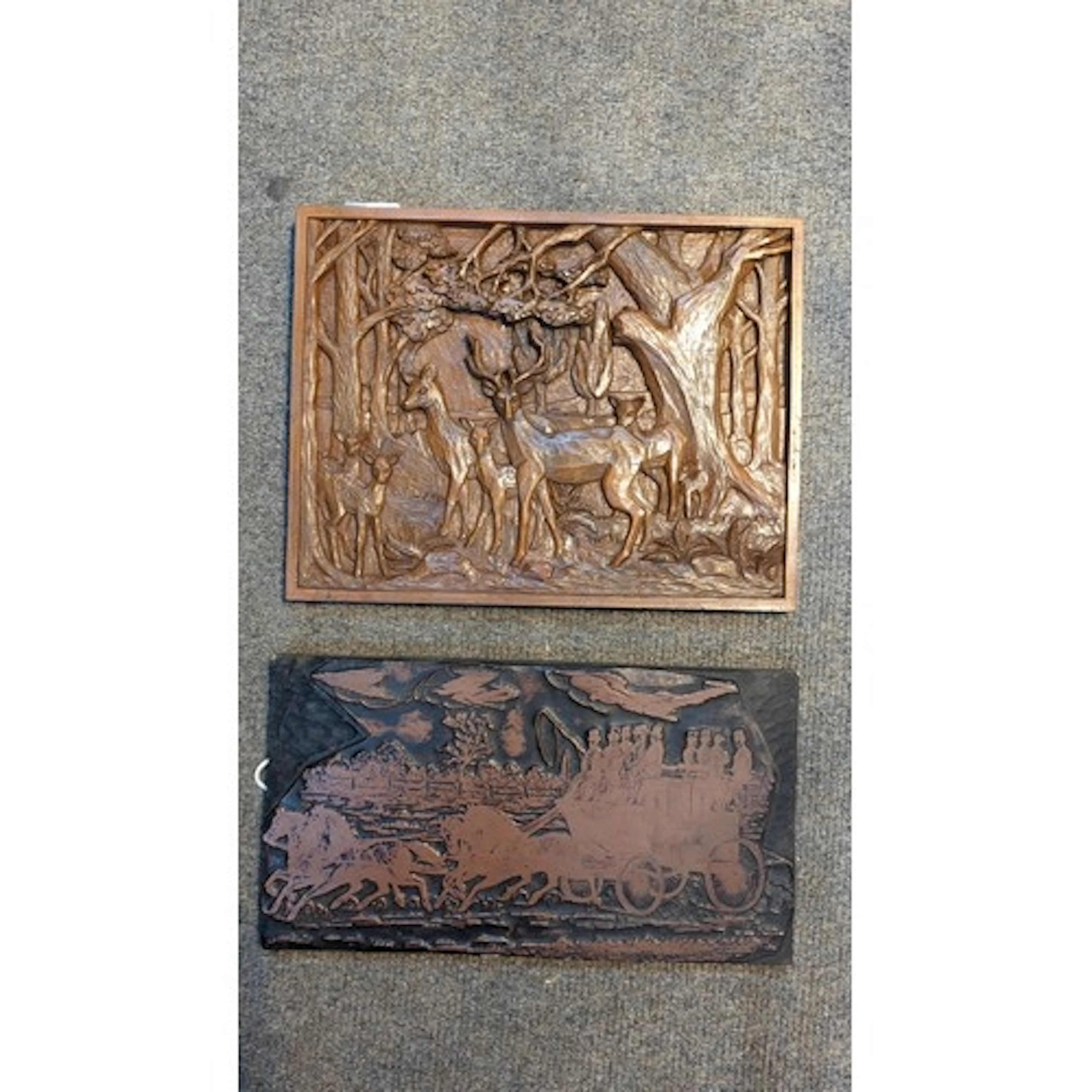 A Black Forest style carved wooden scene of deer in a woodla...
