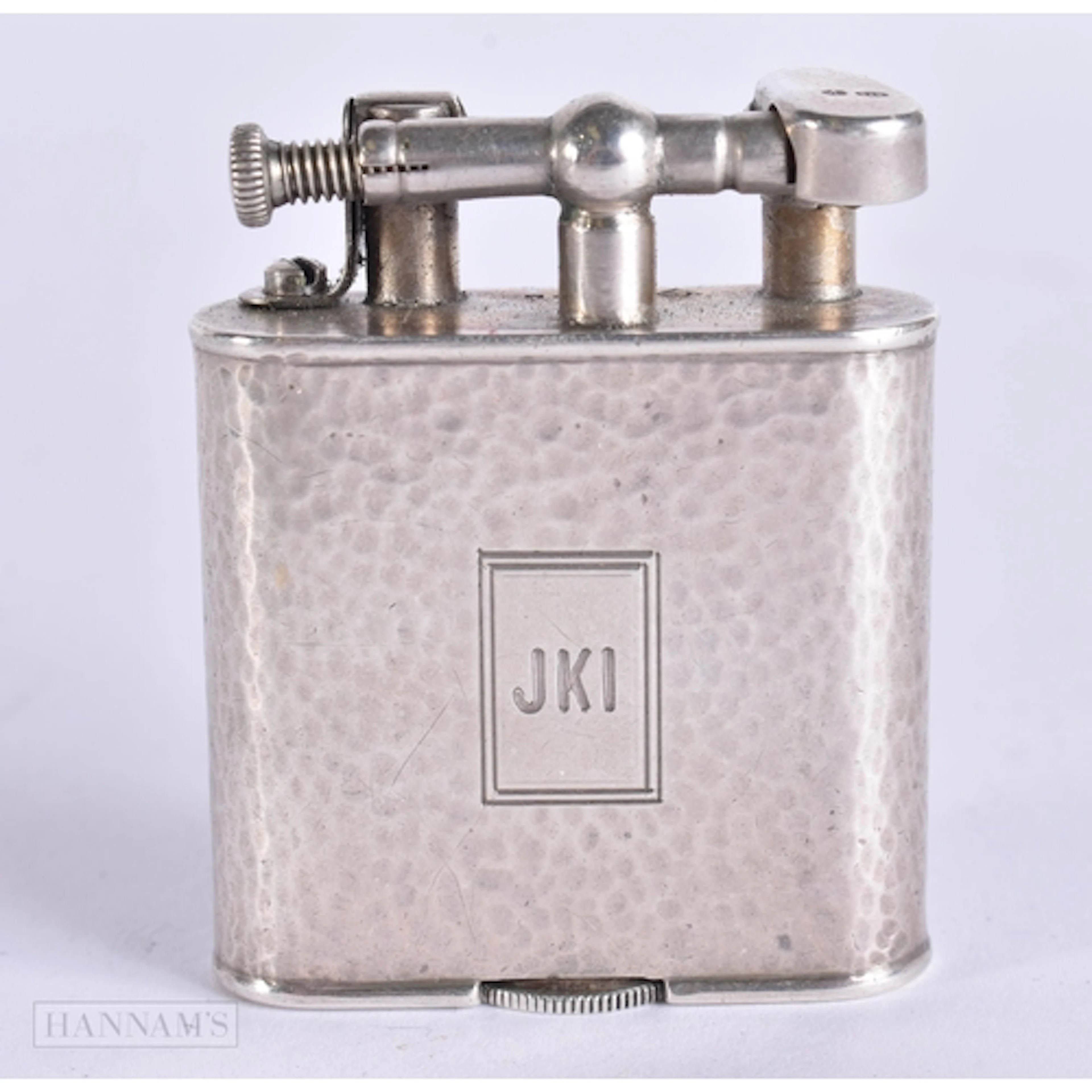 AN ART DECO SILVER DUNHILL LIGHTER. 4.5 cm high.