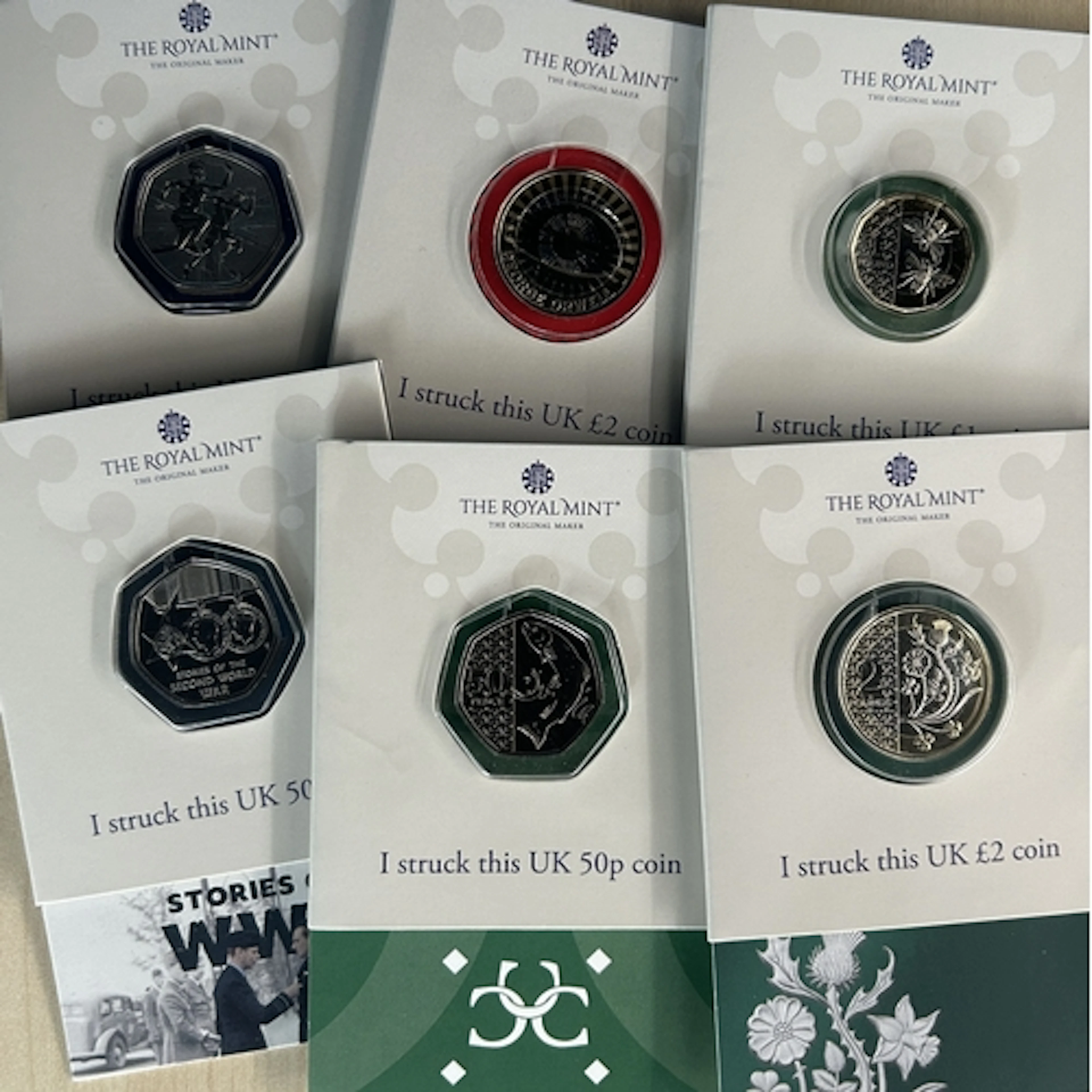 A group of six Great Britain Royal Mint Strike Your Own coin...