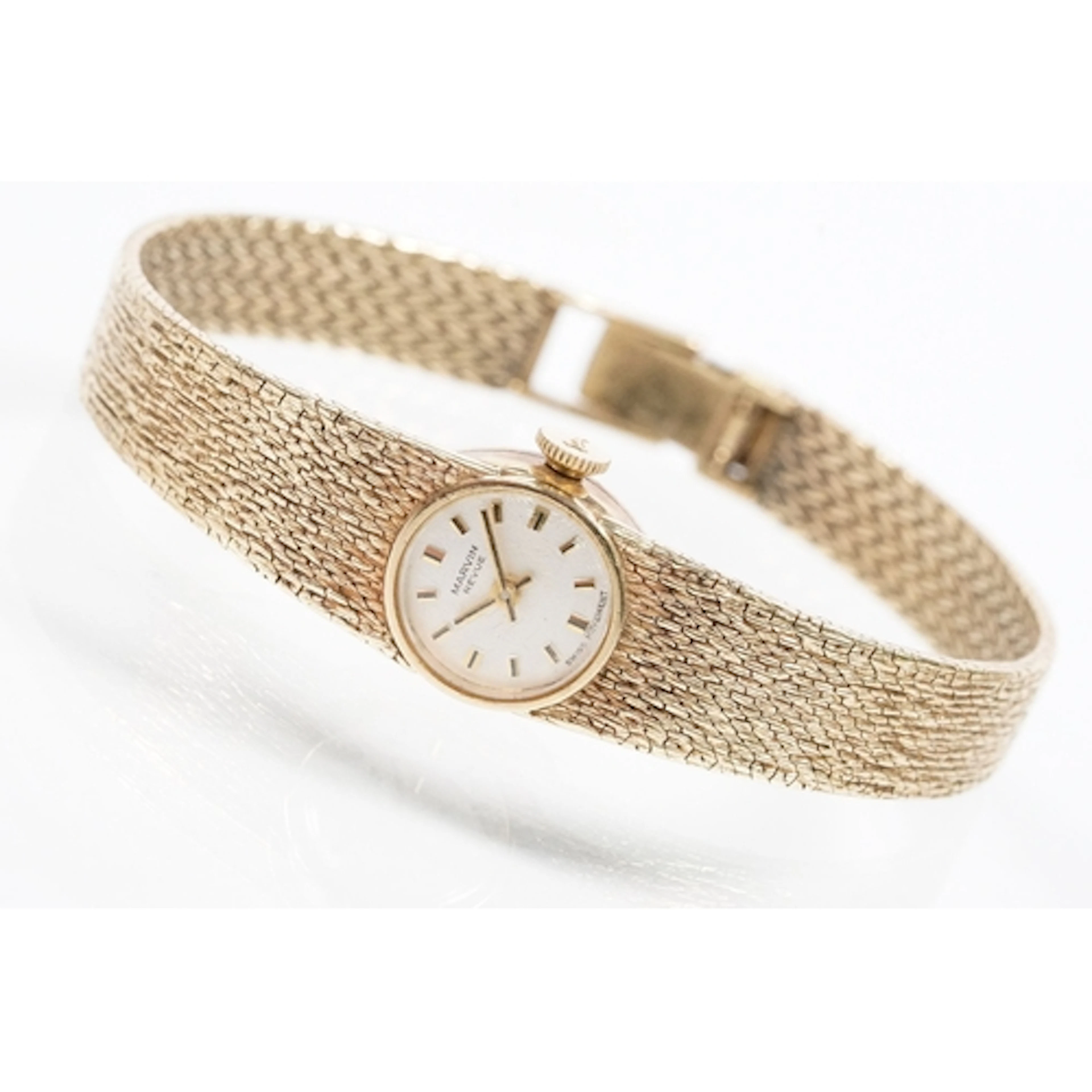 9ct gold Marvin ladies wrist watch having a round face with ...