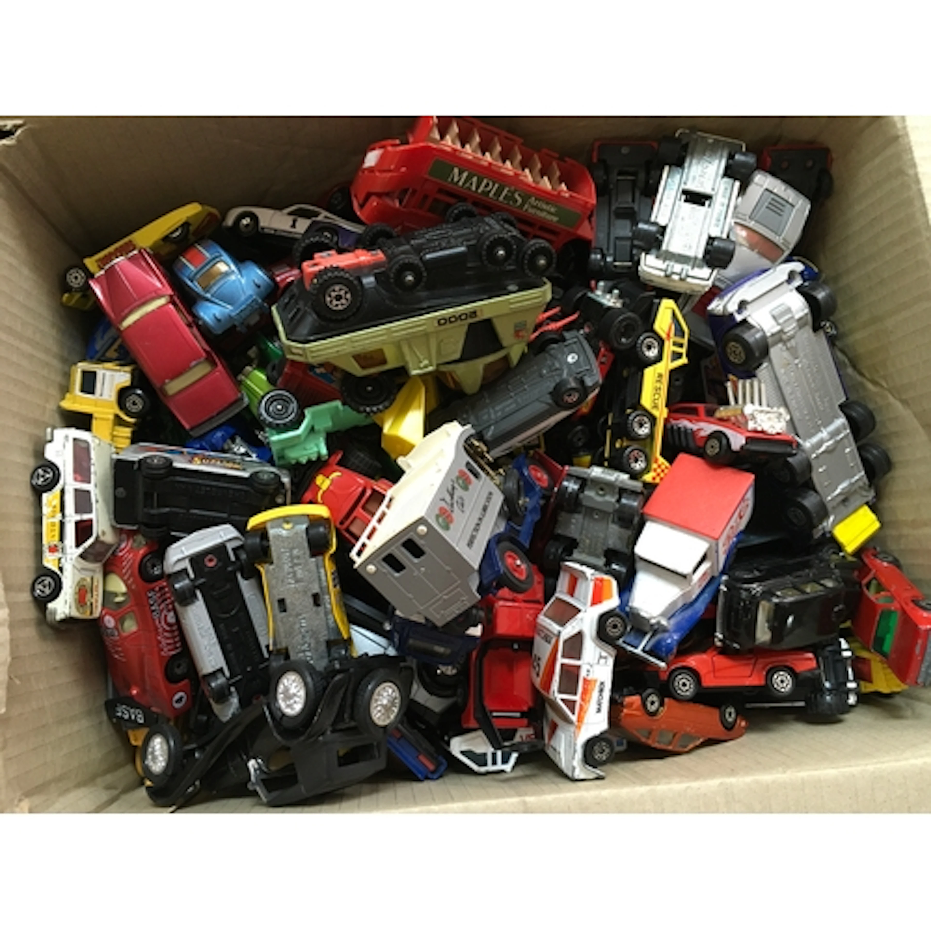 A collection of assorted playworn die cast vehicles includin...