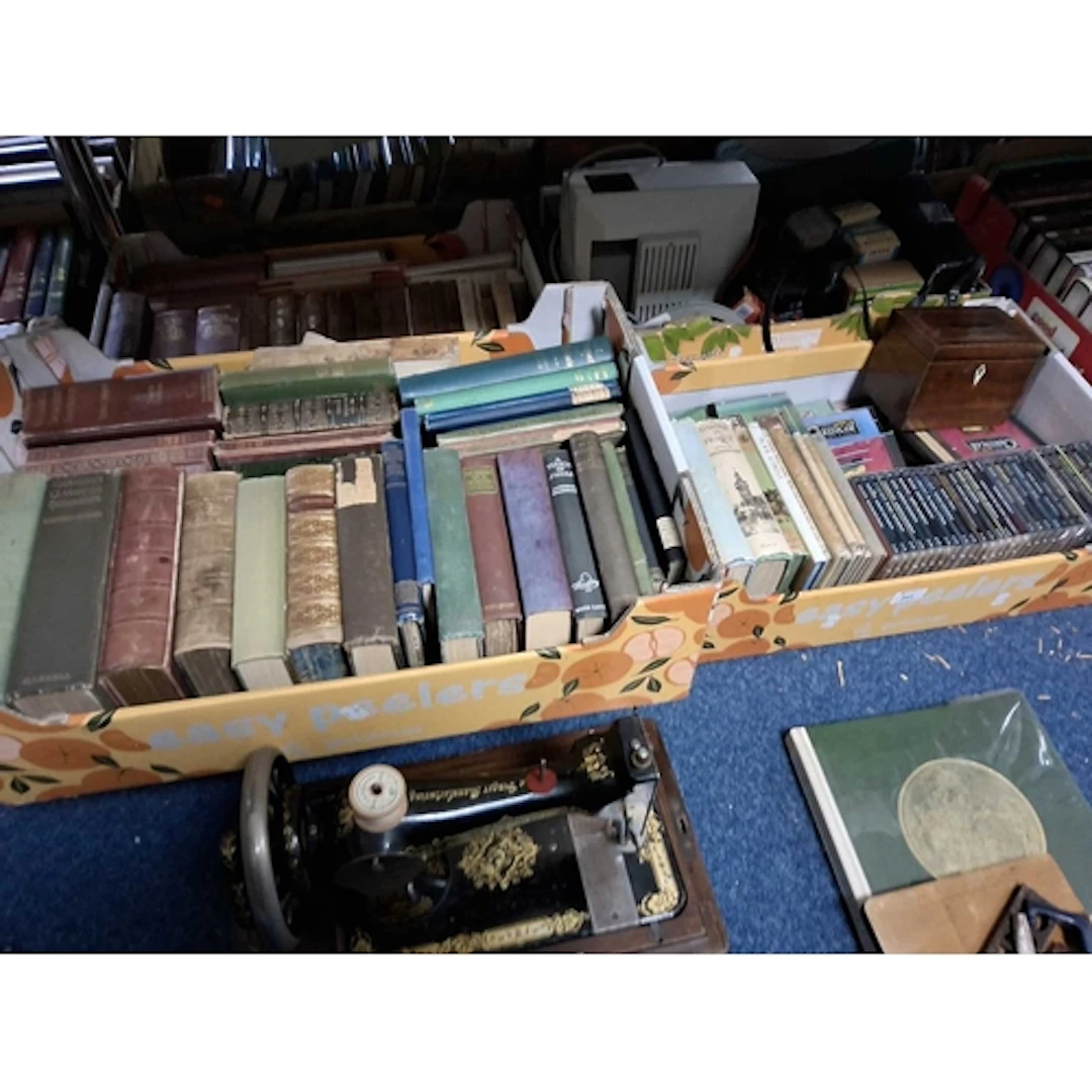 FOUR BOXES OF GENERAL HOUSEHOLD ITEMS to include a cased Sin...