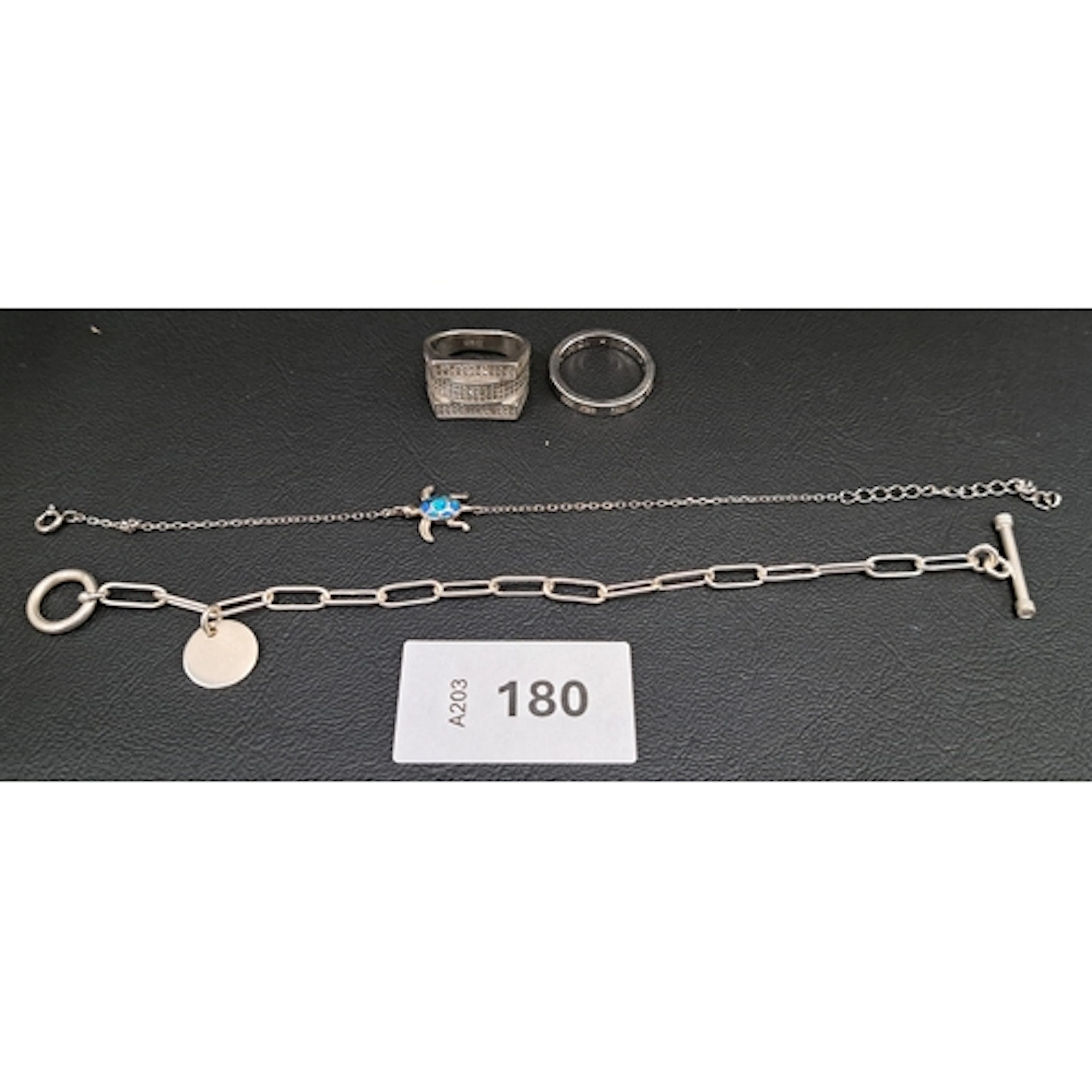 FOUR PIECES OF SILVER JEWELLERY comprising a mosaic opal tor...
