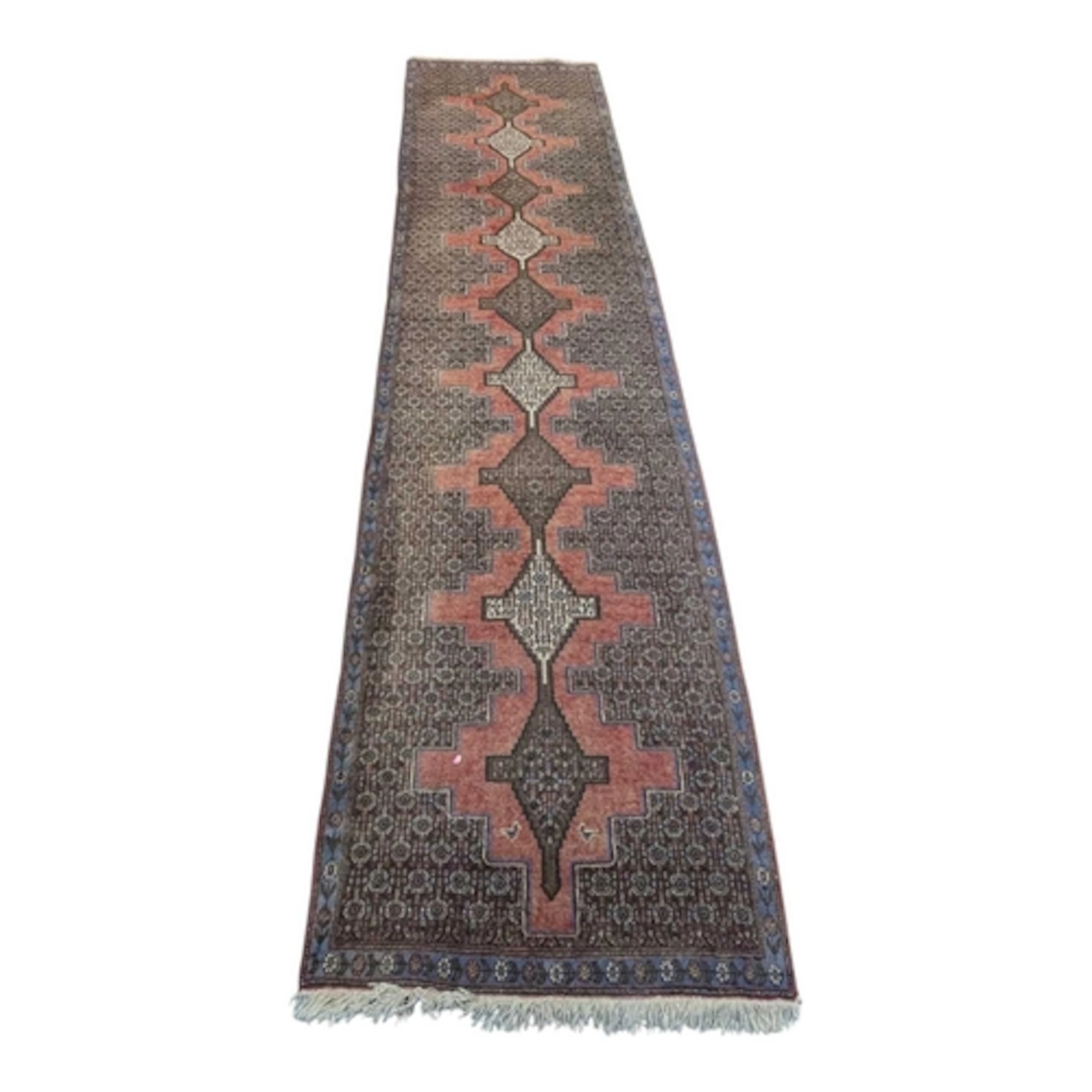 A 20th century Bidjar Iranian runner rug. The runner rug hav...