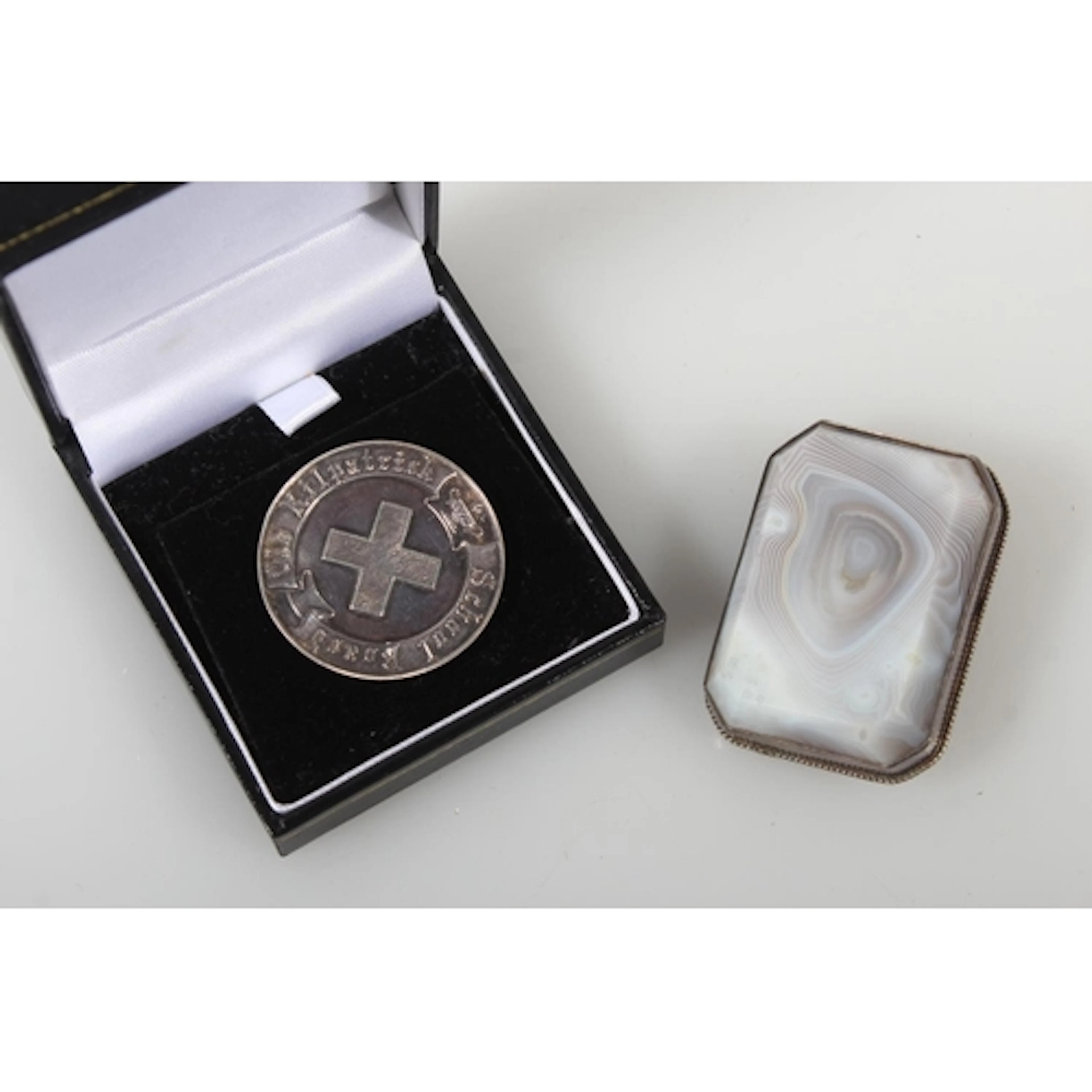 Scottish banded agate brooch and an Old Kirkpatrick School B...