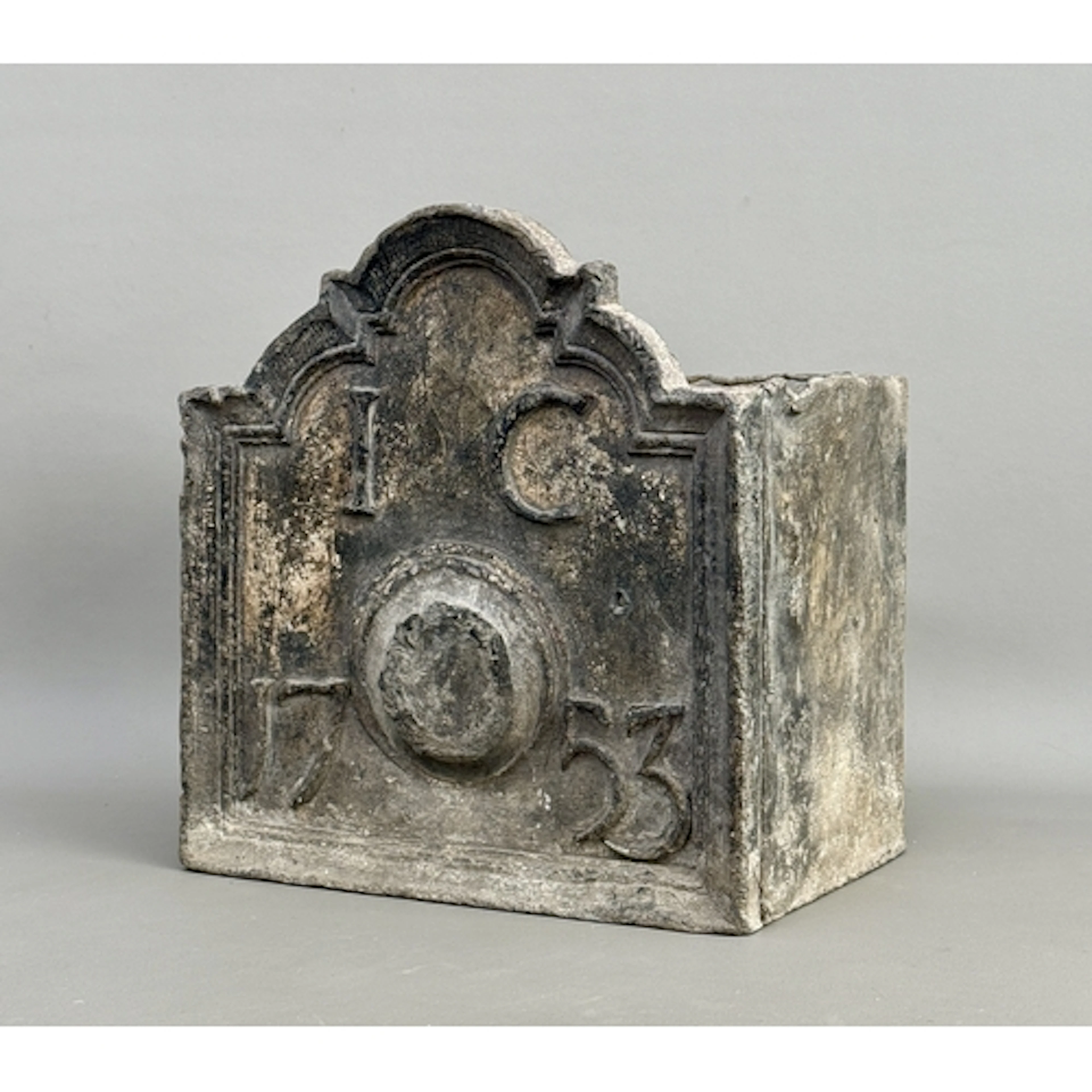 An eighteenth century lead hopper - with raised 'IC' initial...
