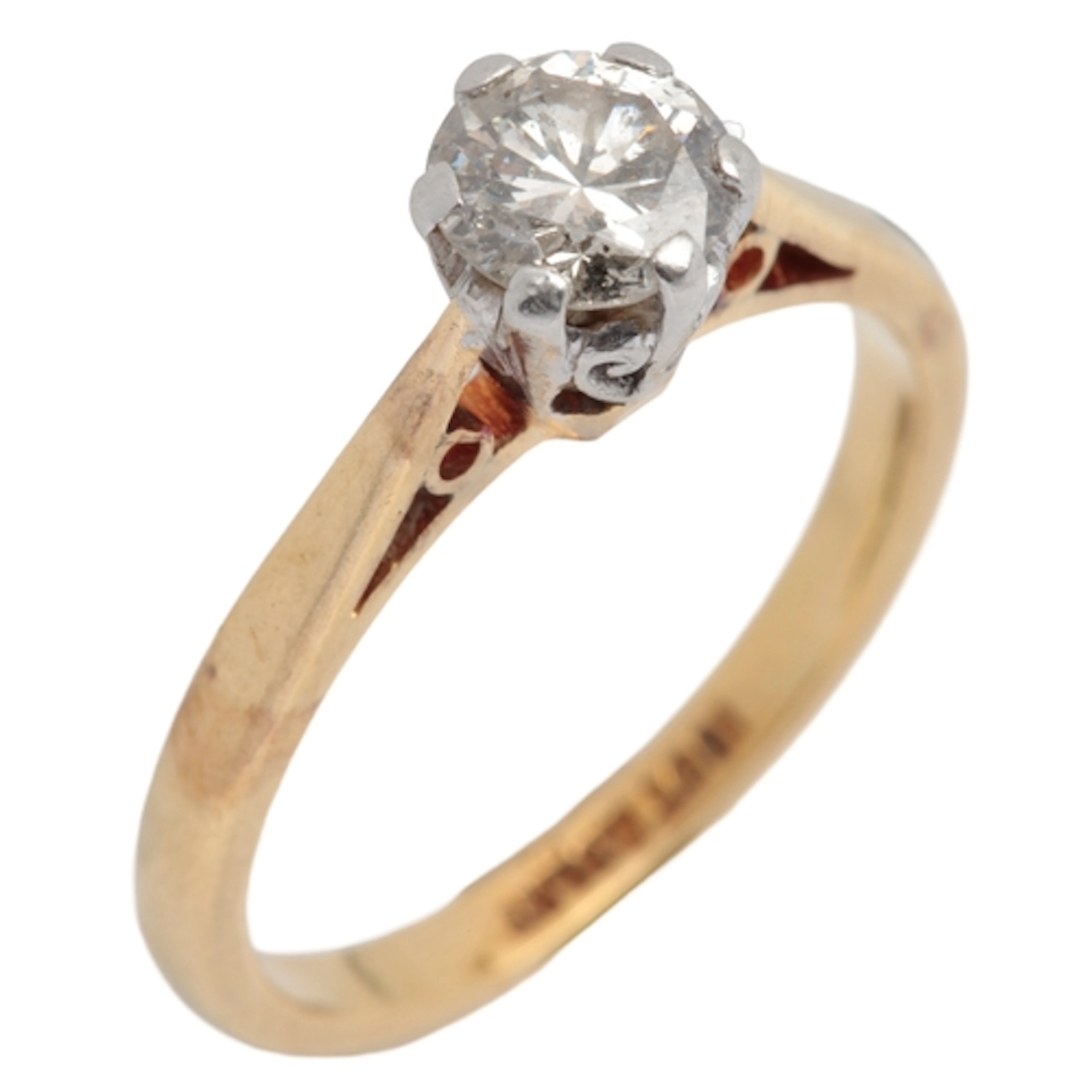 A solitaire diamond ring, claw-set with a circular-cut diamo...